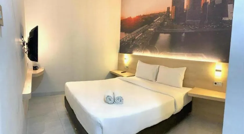 Bed in Cordex Hotel Medan