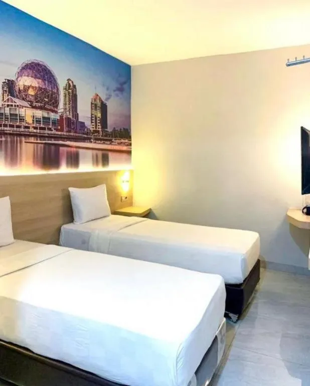 Bed in Cordex Hotel Medan