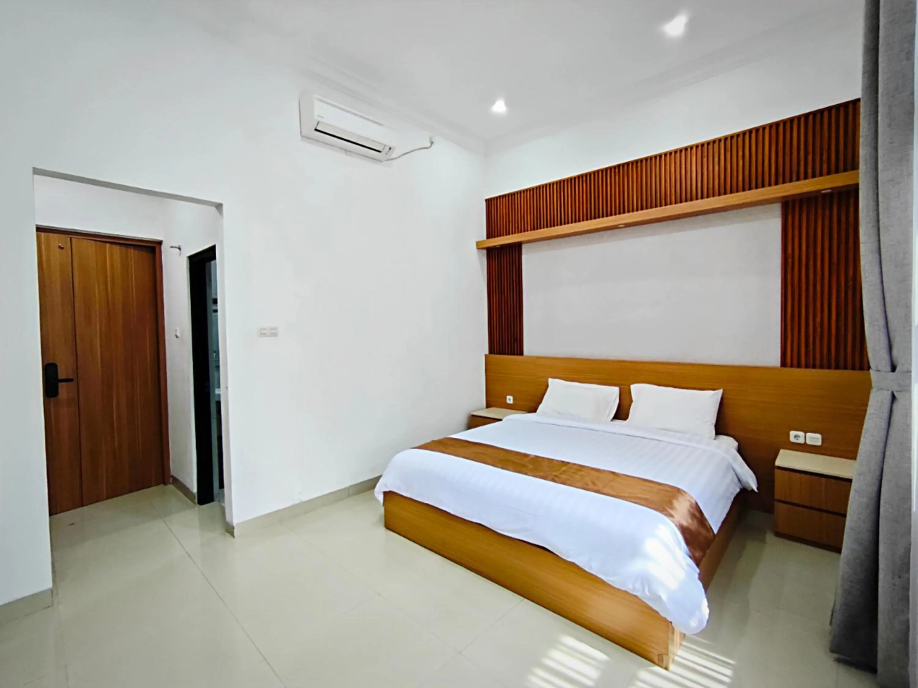 Bed in Twins Hotel Boutique Syariah