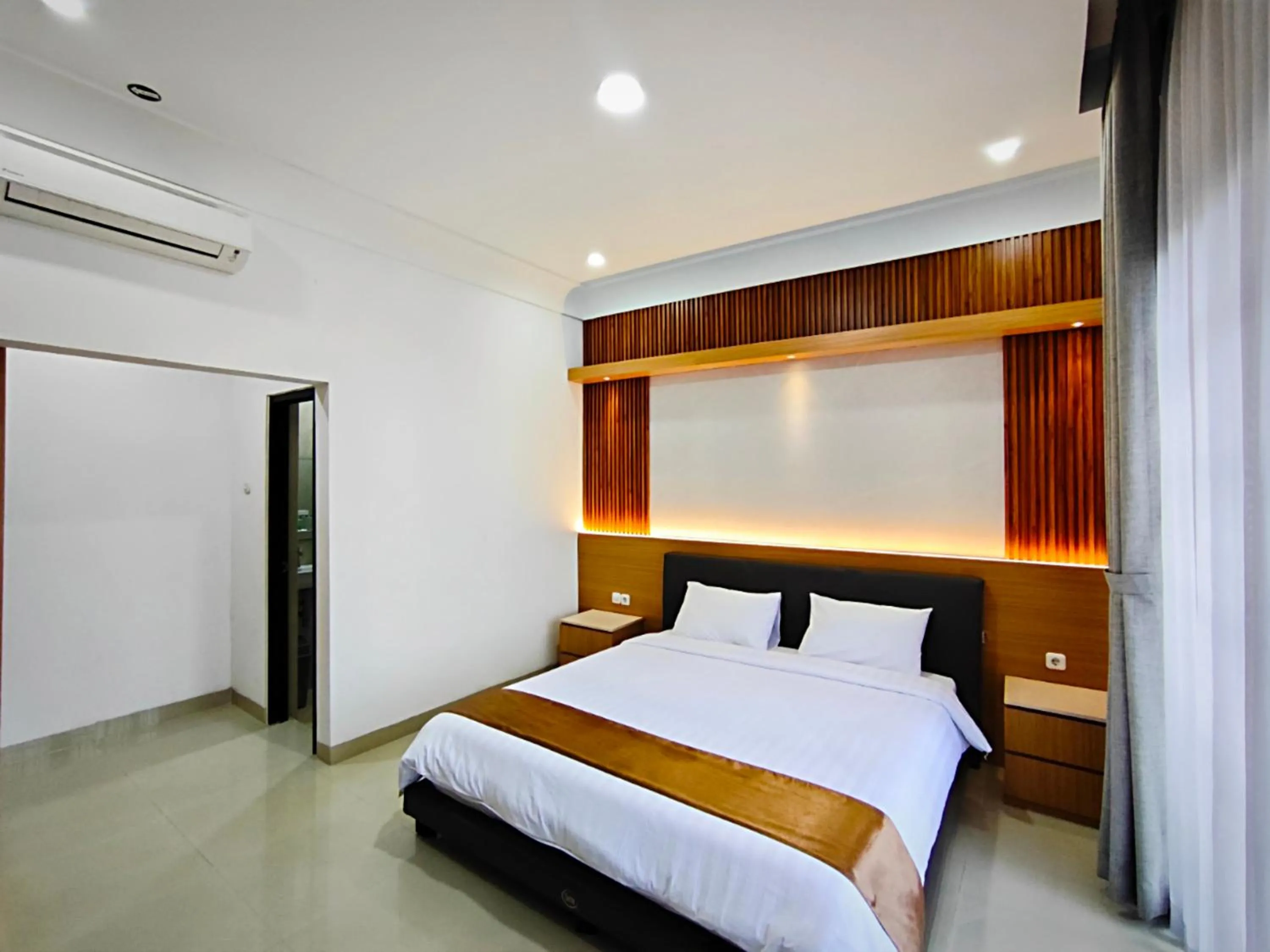 Bed in Twins Hotel Boutique Syariah