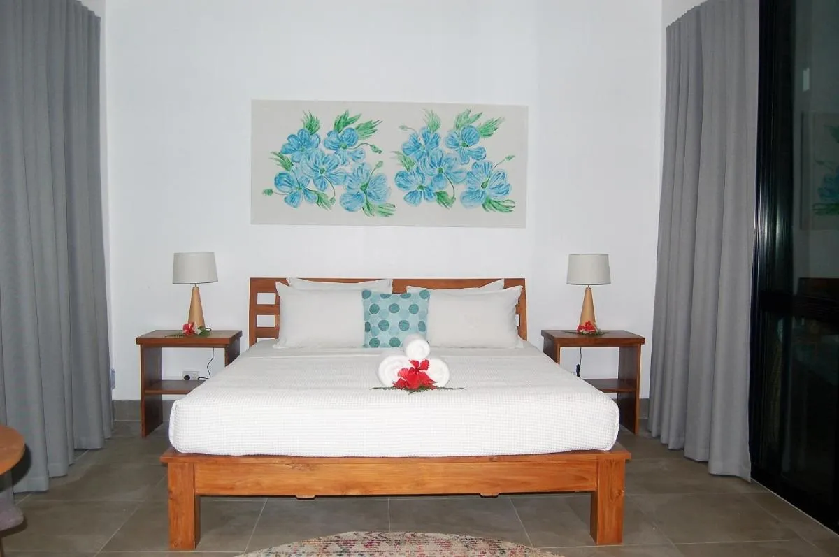 Photo of the whole room, Bed in Barrier Beach Resort