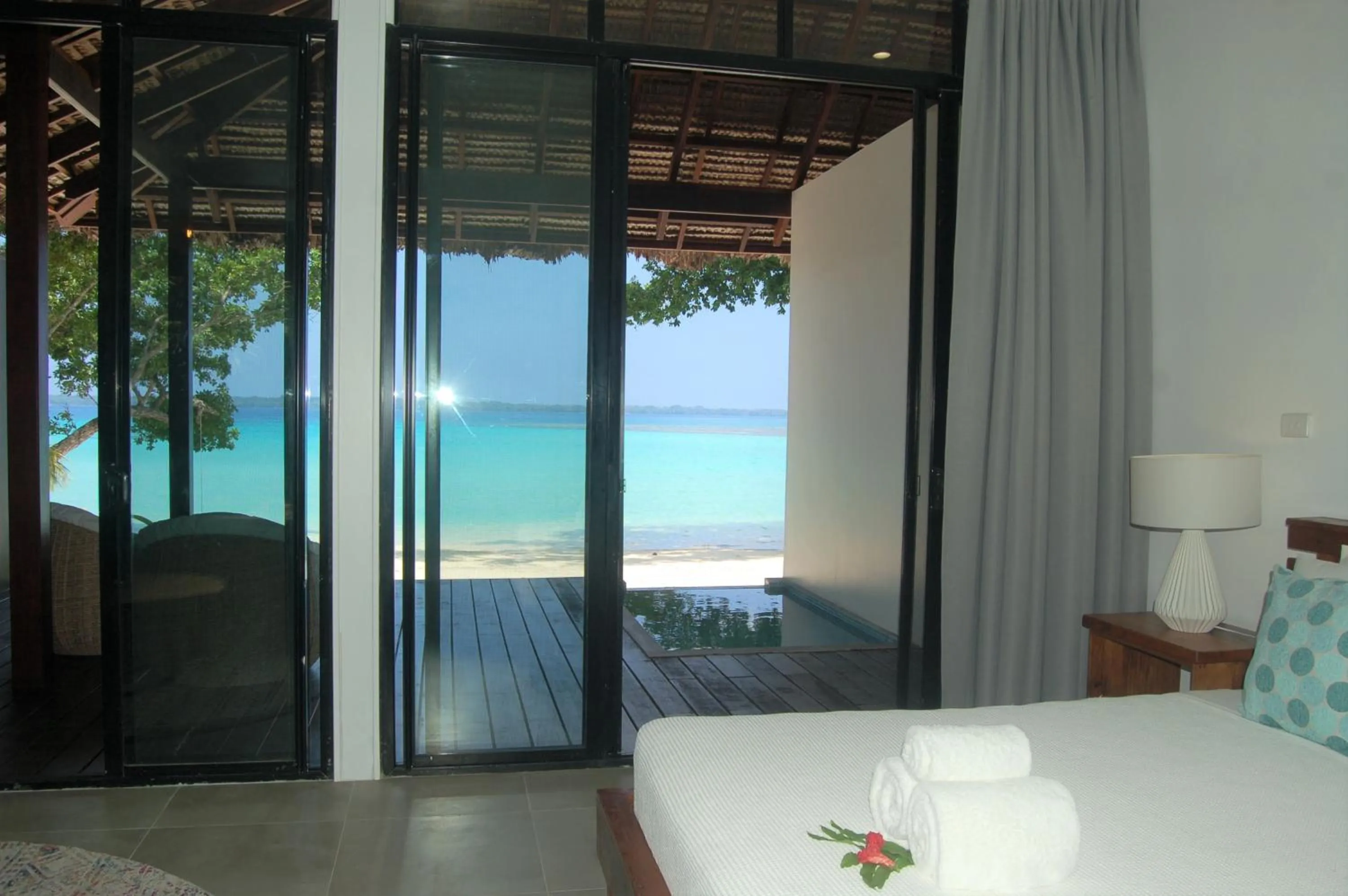 Bed in Barrier Beach Resort