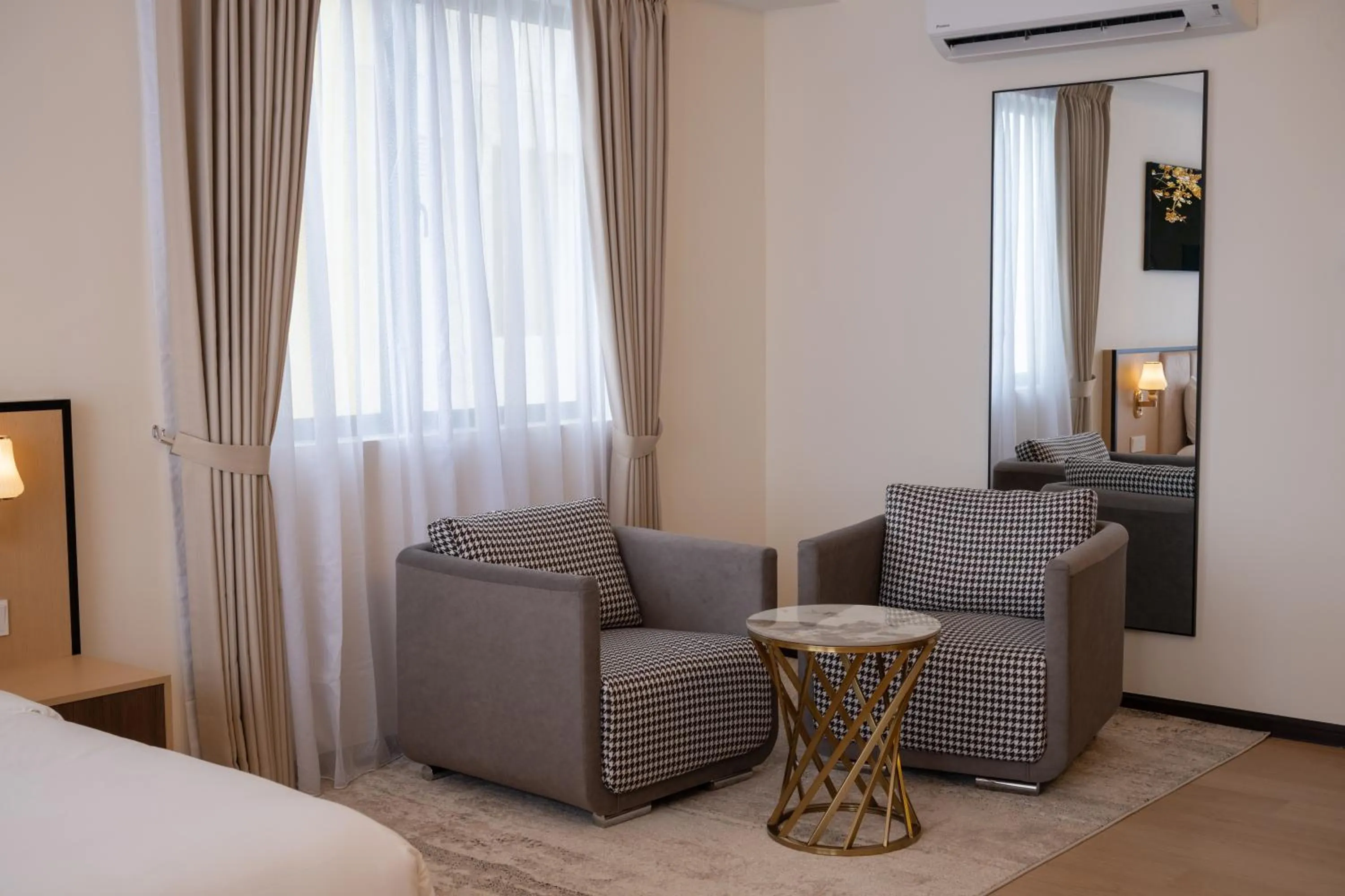 Seating area, Bed in Asteria Melaka by Attic Suite