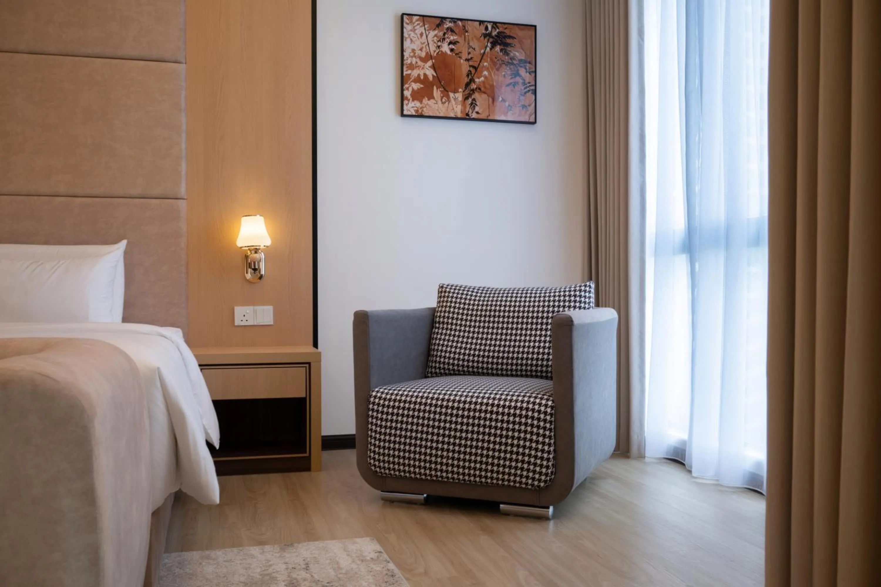 Seating area, Bed in Asteria Melaka by Attic Suite