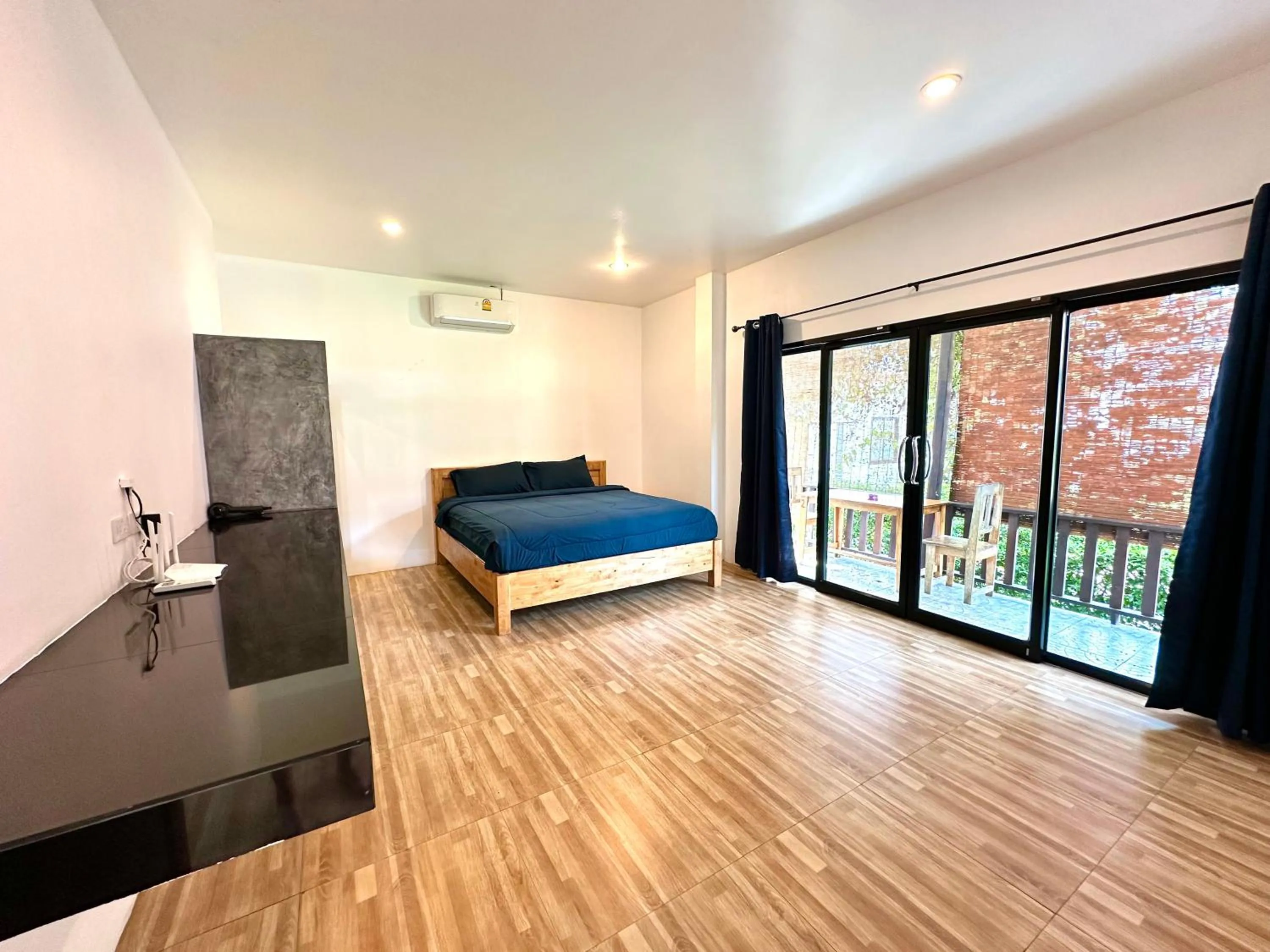 Bed in The Scenery Beach Resort