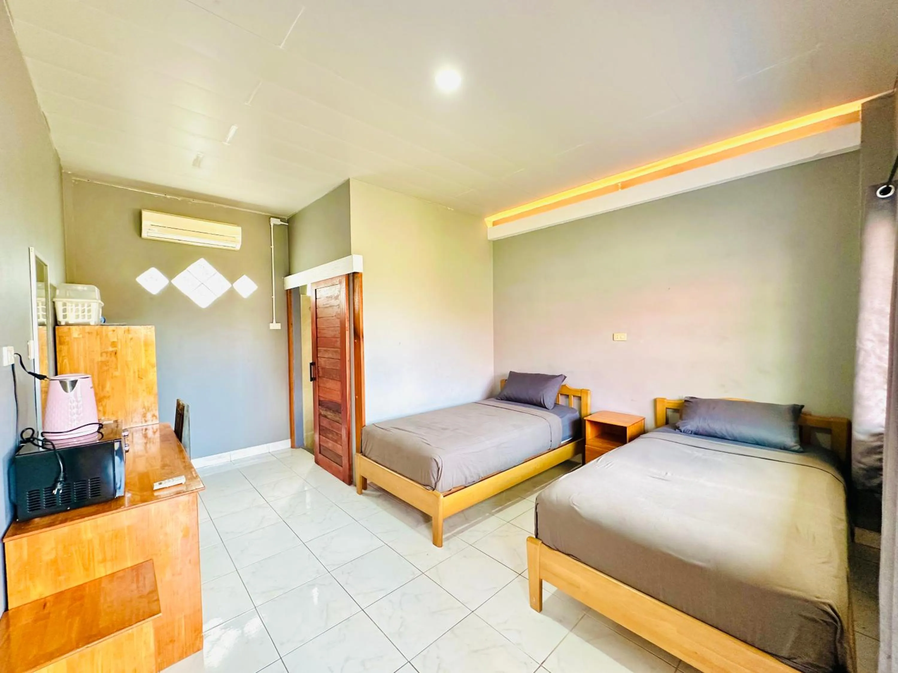 Bed in The Scenery Beach Resort