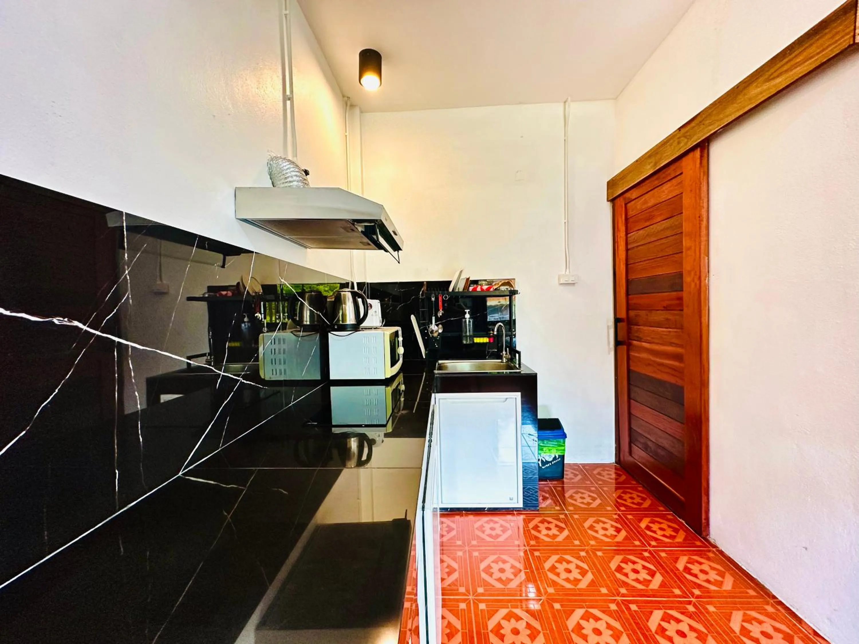 Kitchen or kitchenette in The Scenery Beach Resort