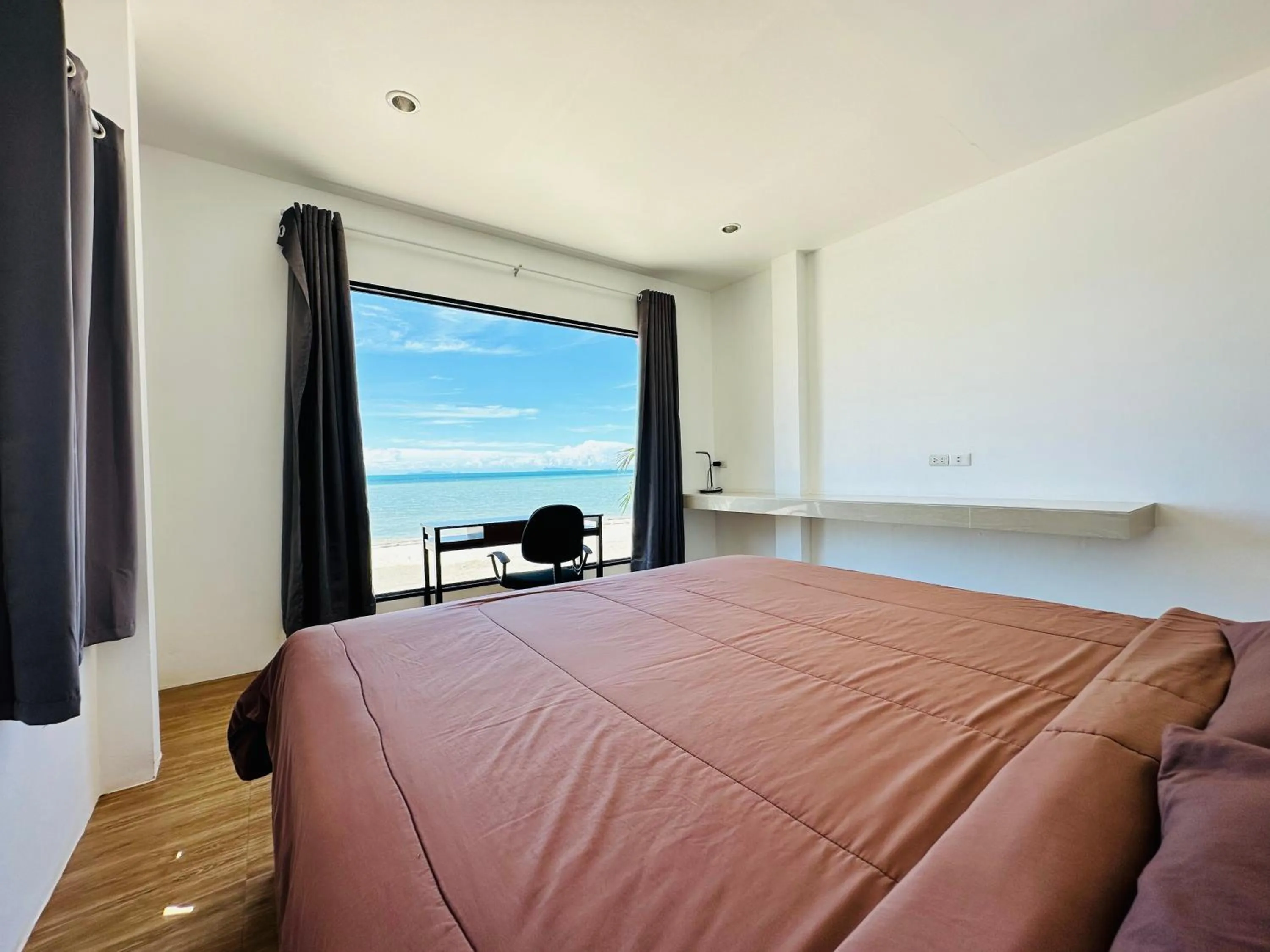 Bed in The Scenery Beach Resort