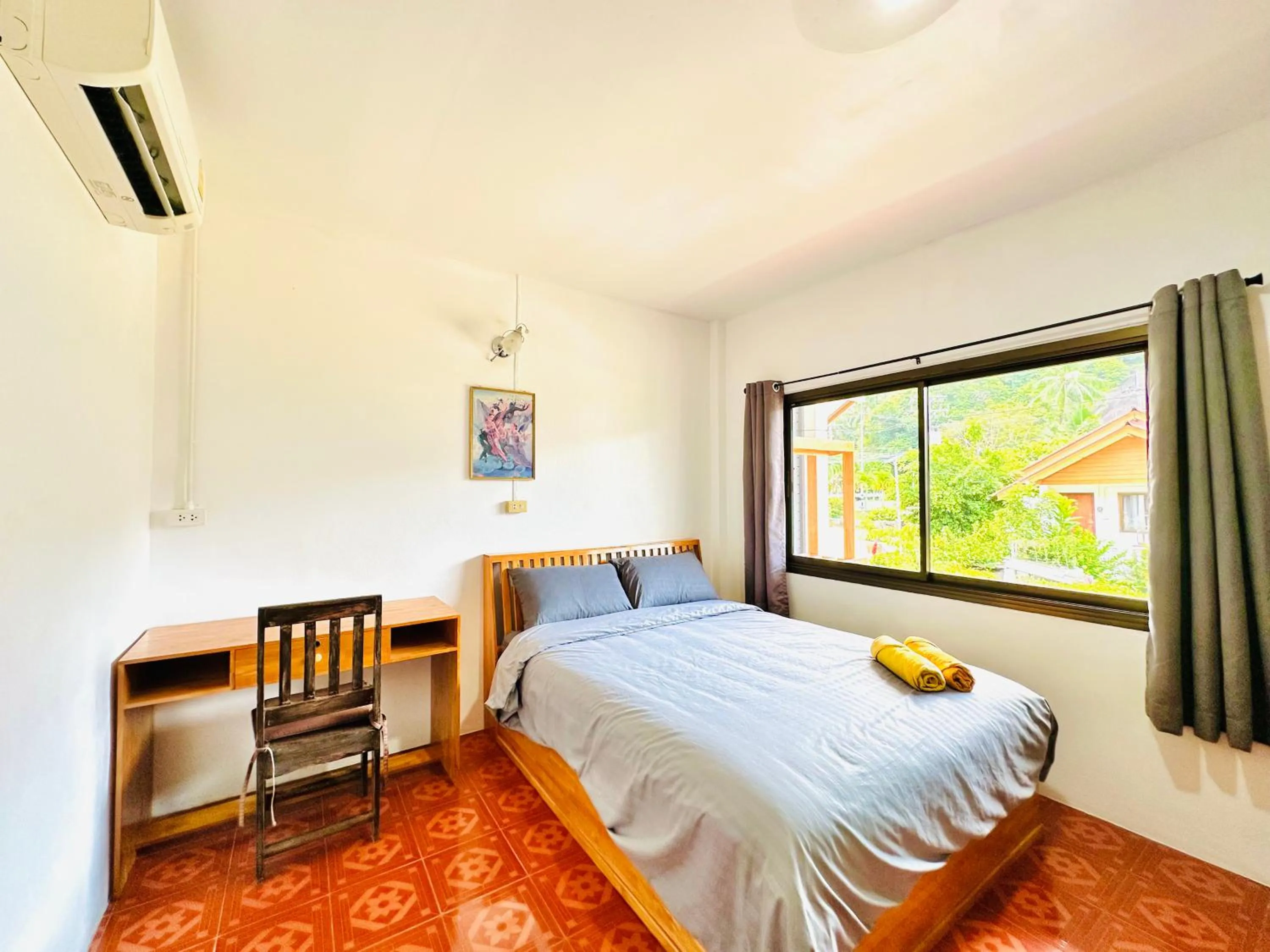 Bed in The Scenery Beach Resort