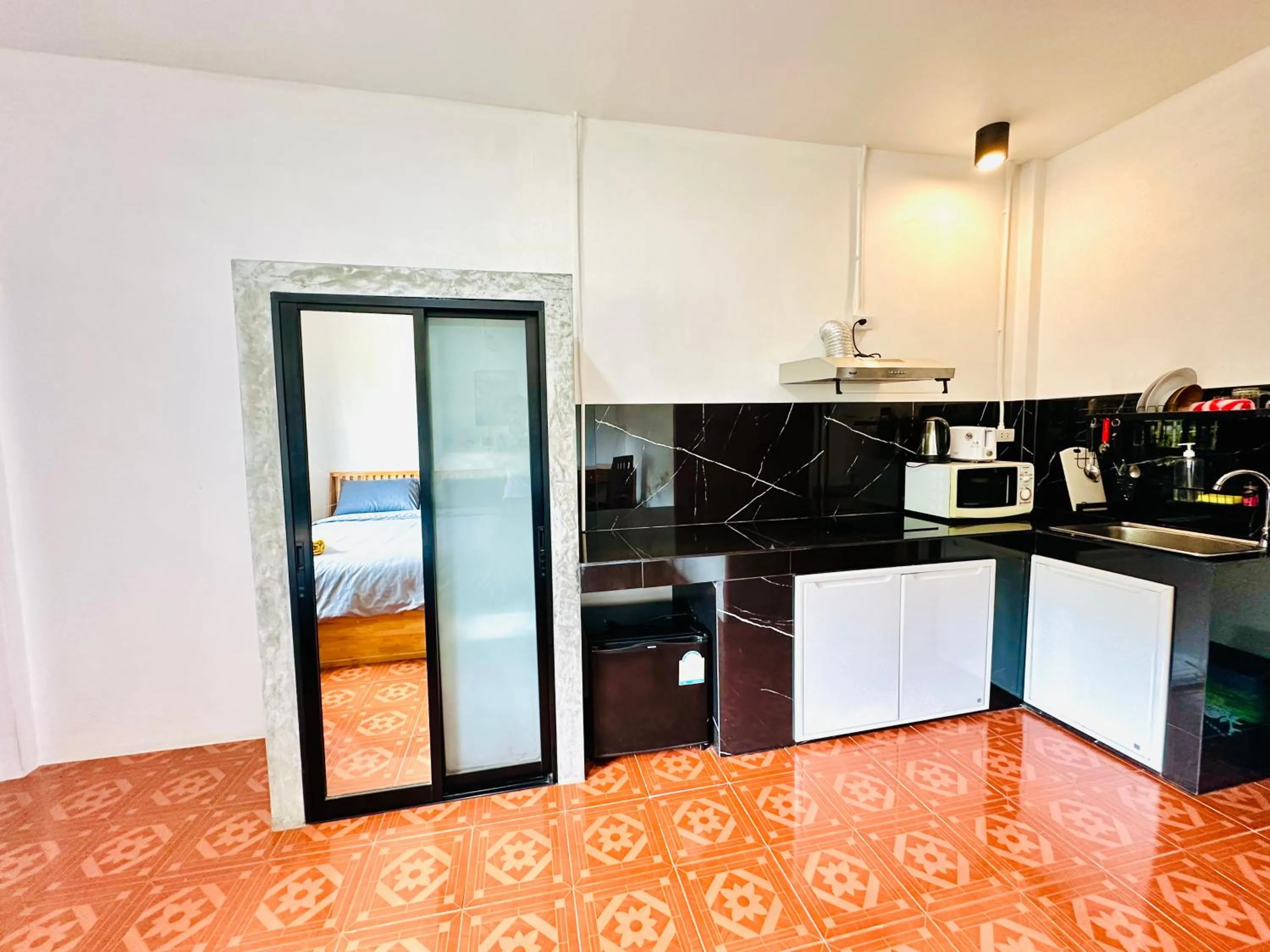 Kitchen or kitchenette in The Scenery Beach Resort