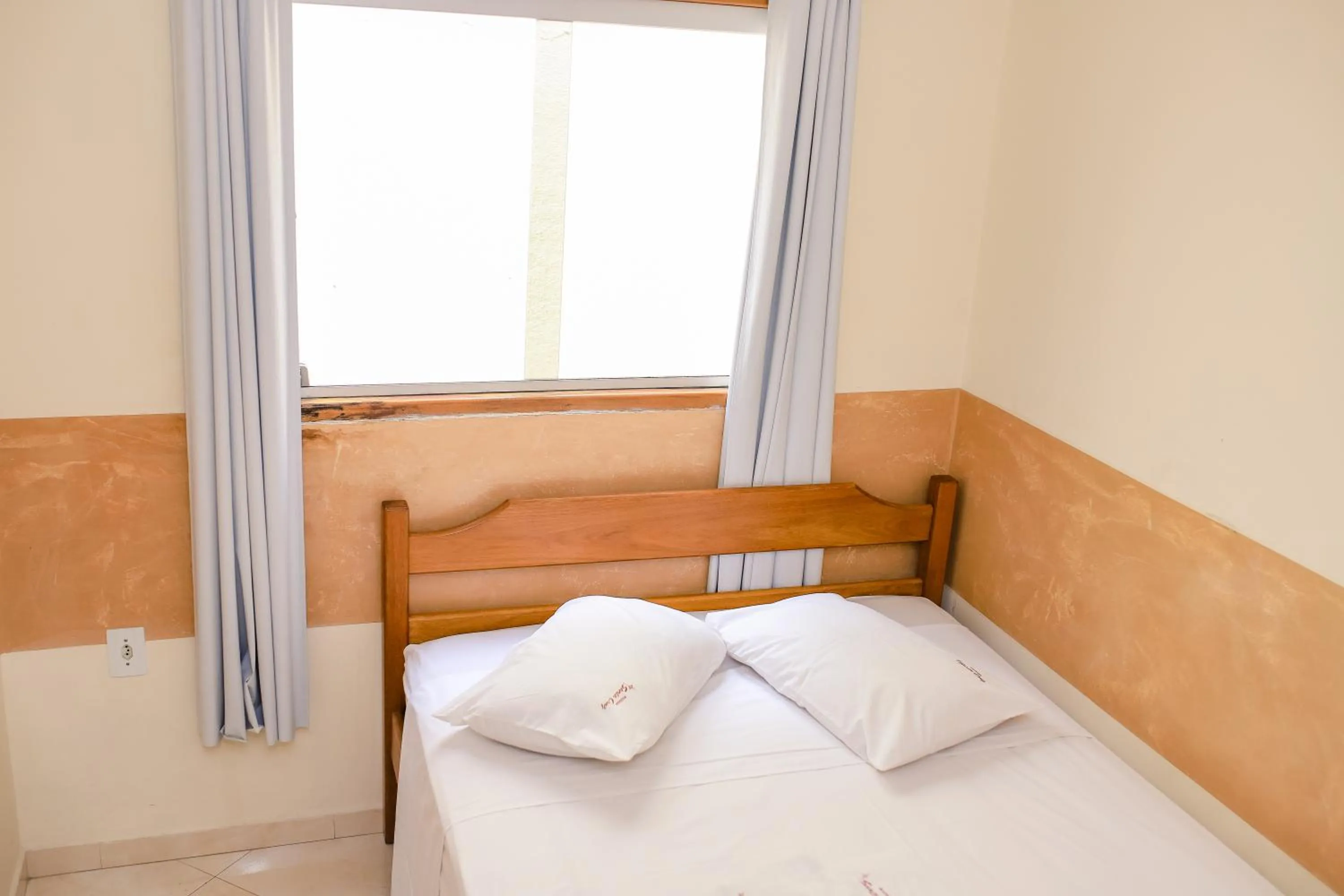 Bed in Pousada Santa Cruz