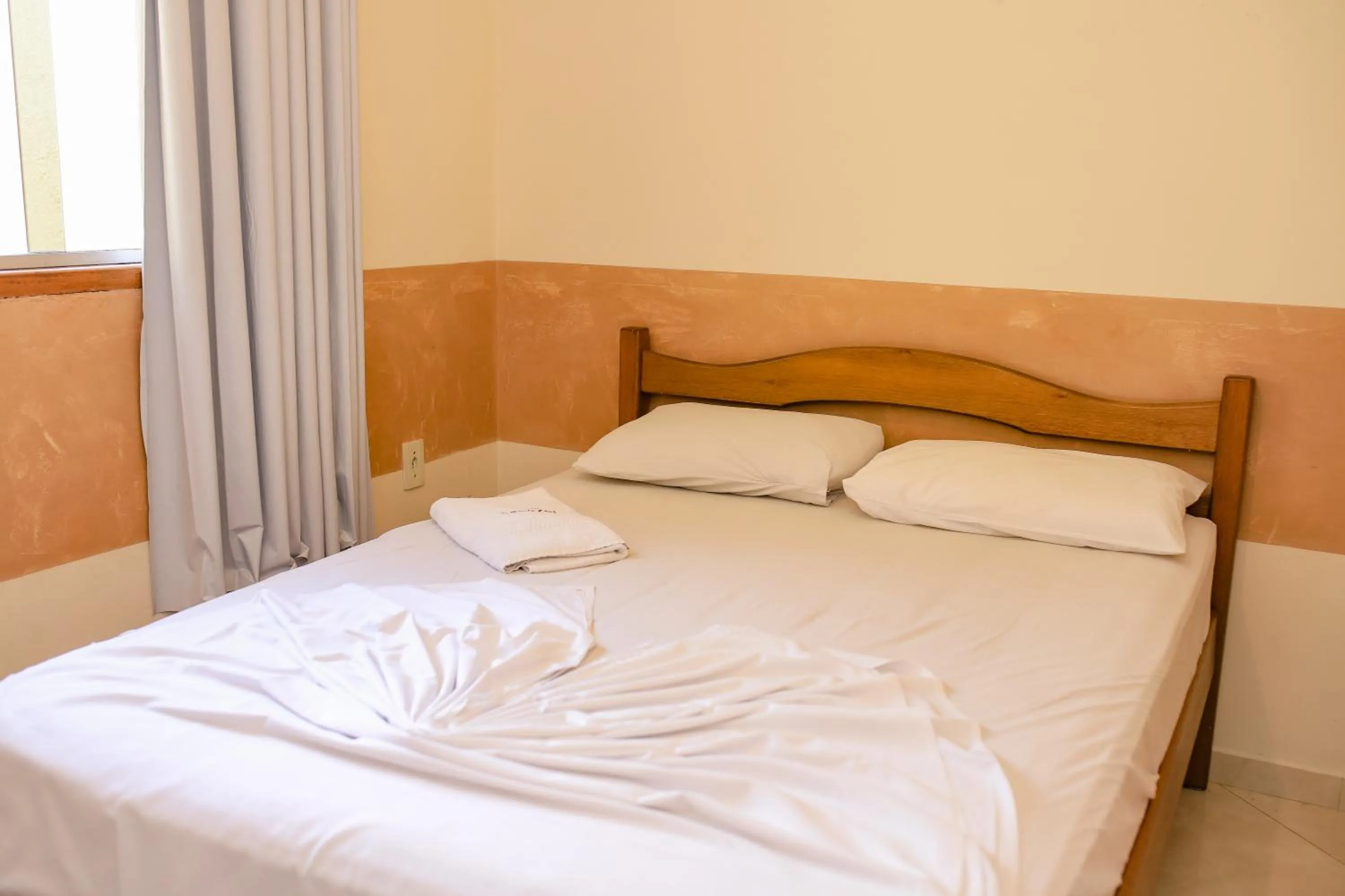 Bed in Pousada Santa Cruz