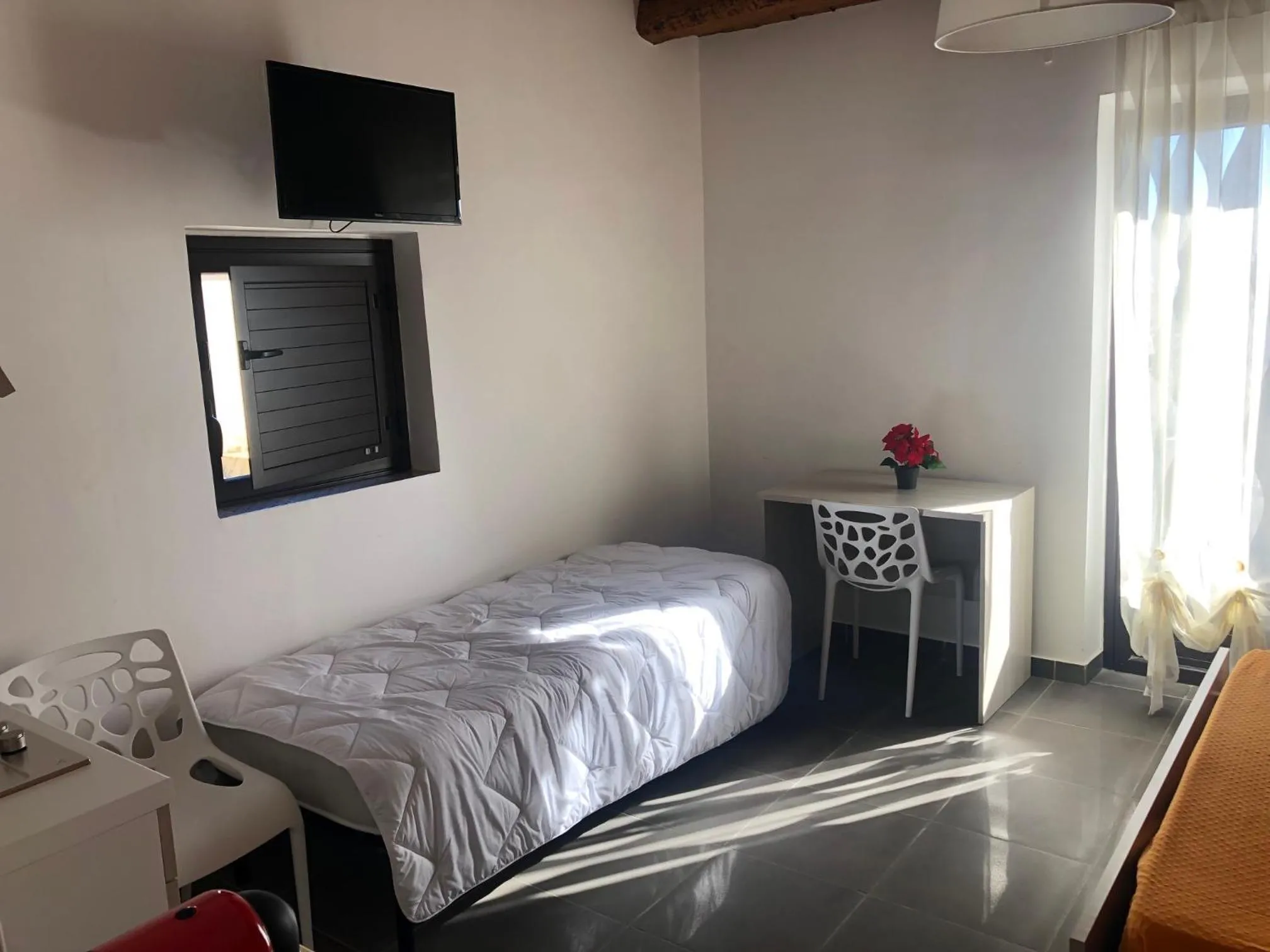 Bed in San Giorgio Rooms