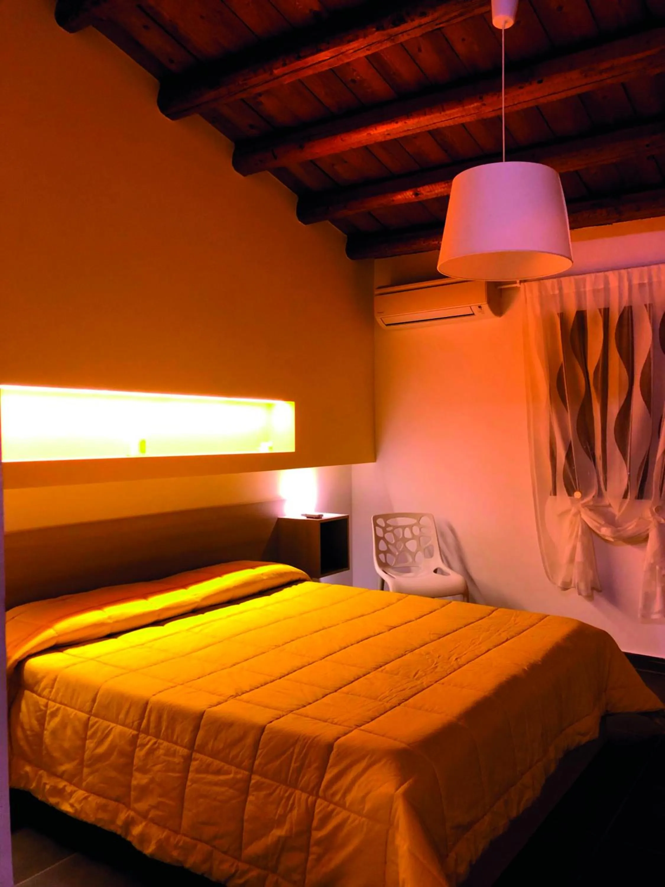 Bed in San Giorgio Rooms
