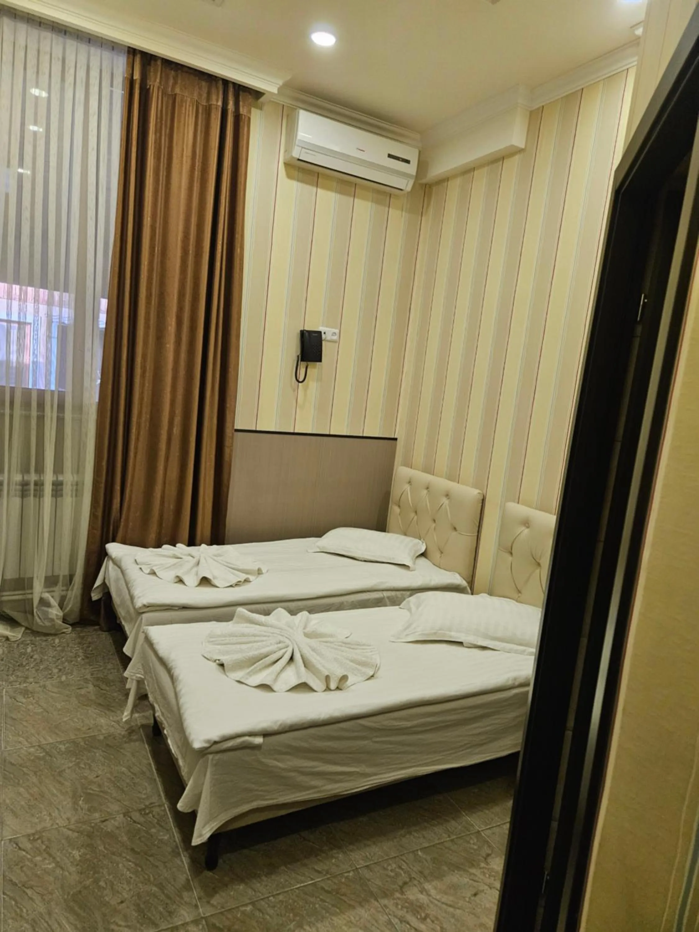 Bed in Eridana Hotel