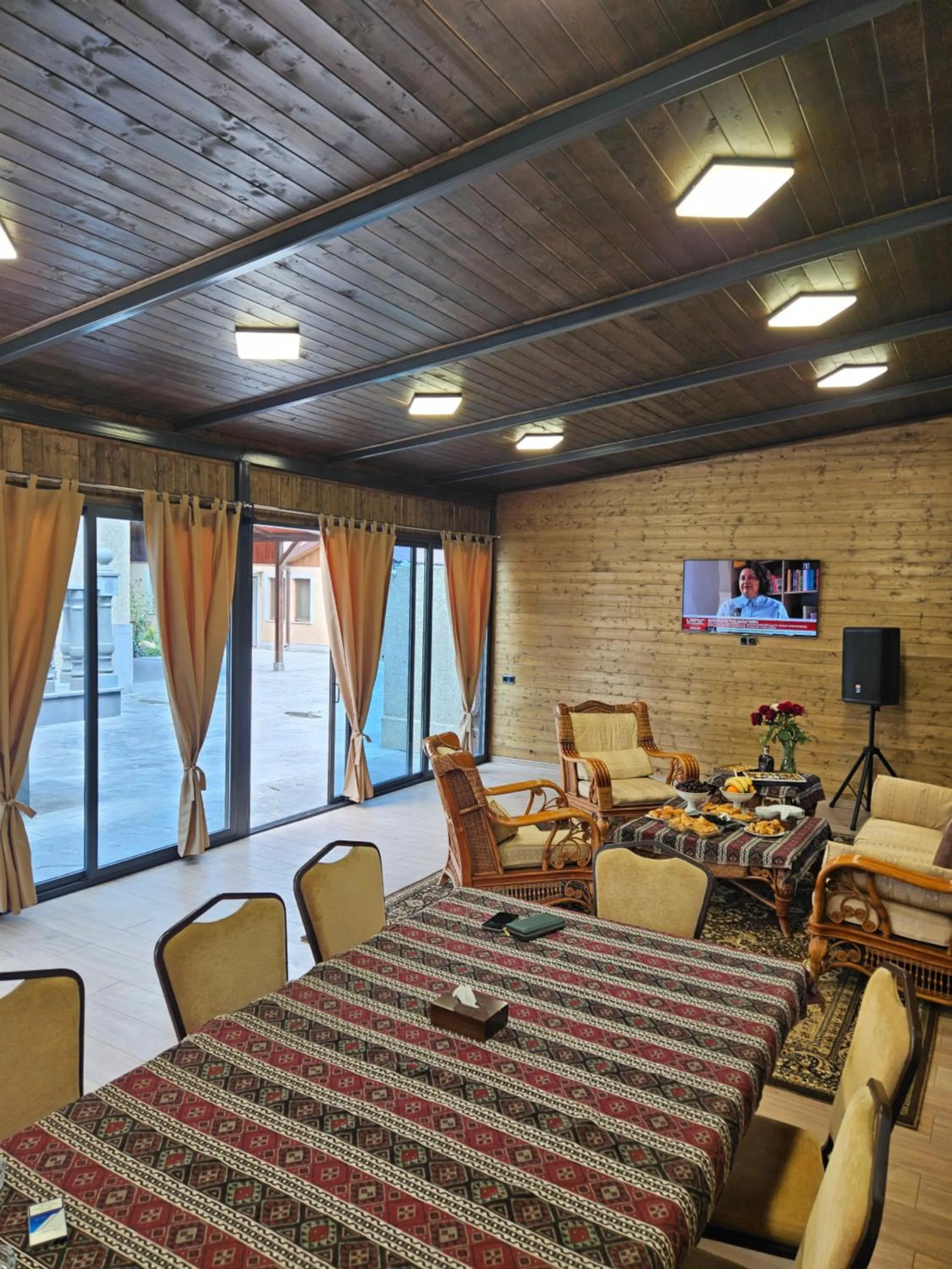Communal lounge/ TV room in Eridana Hotel