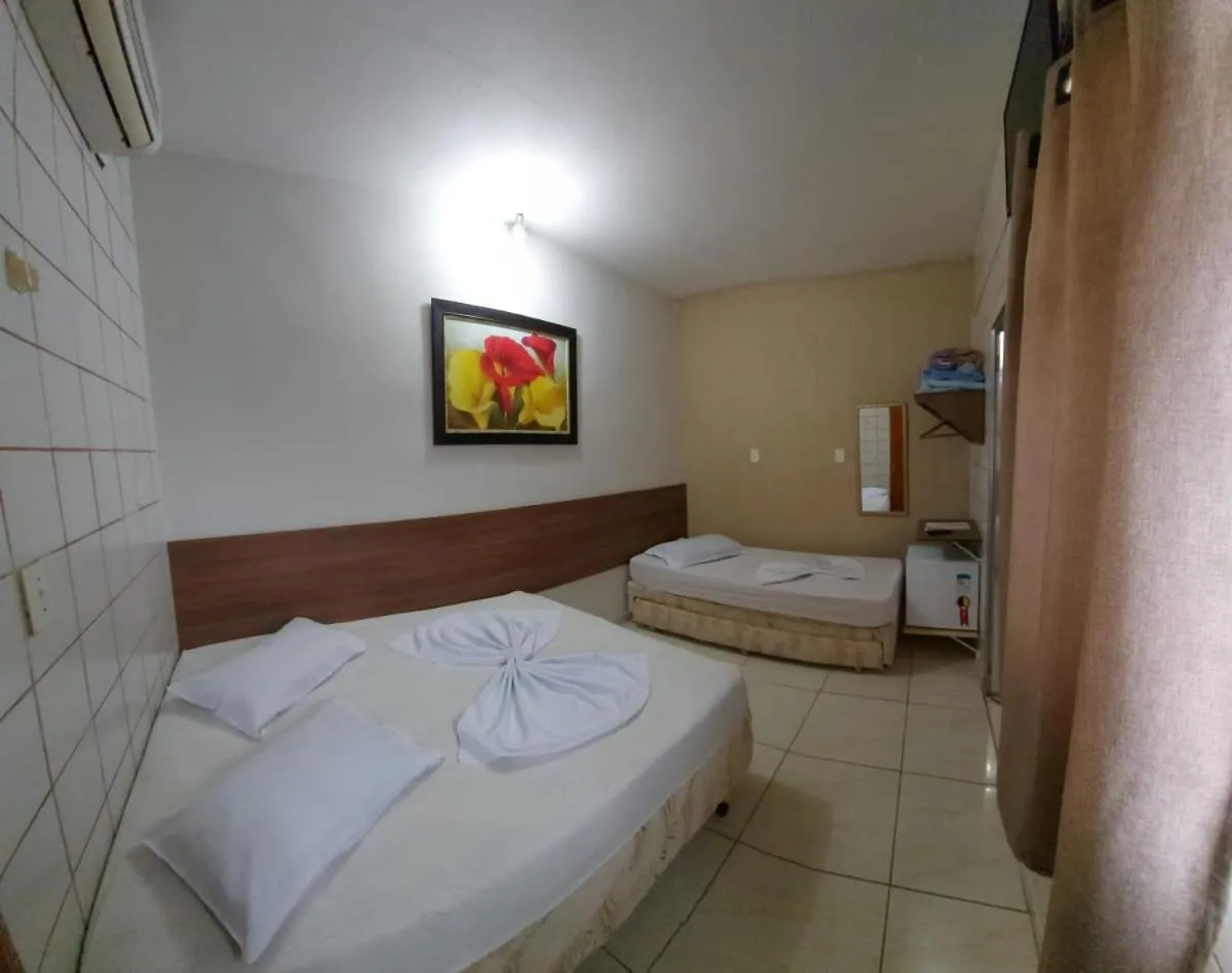 Bed in Pousada Santa Terezinha