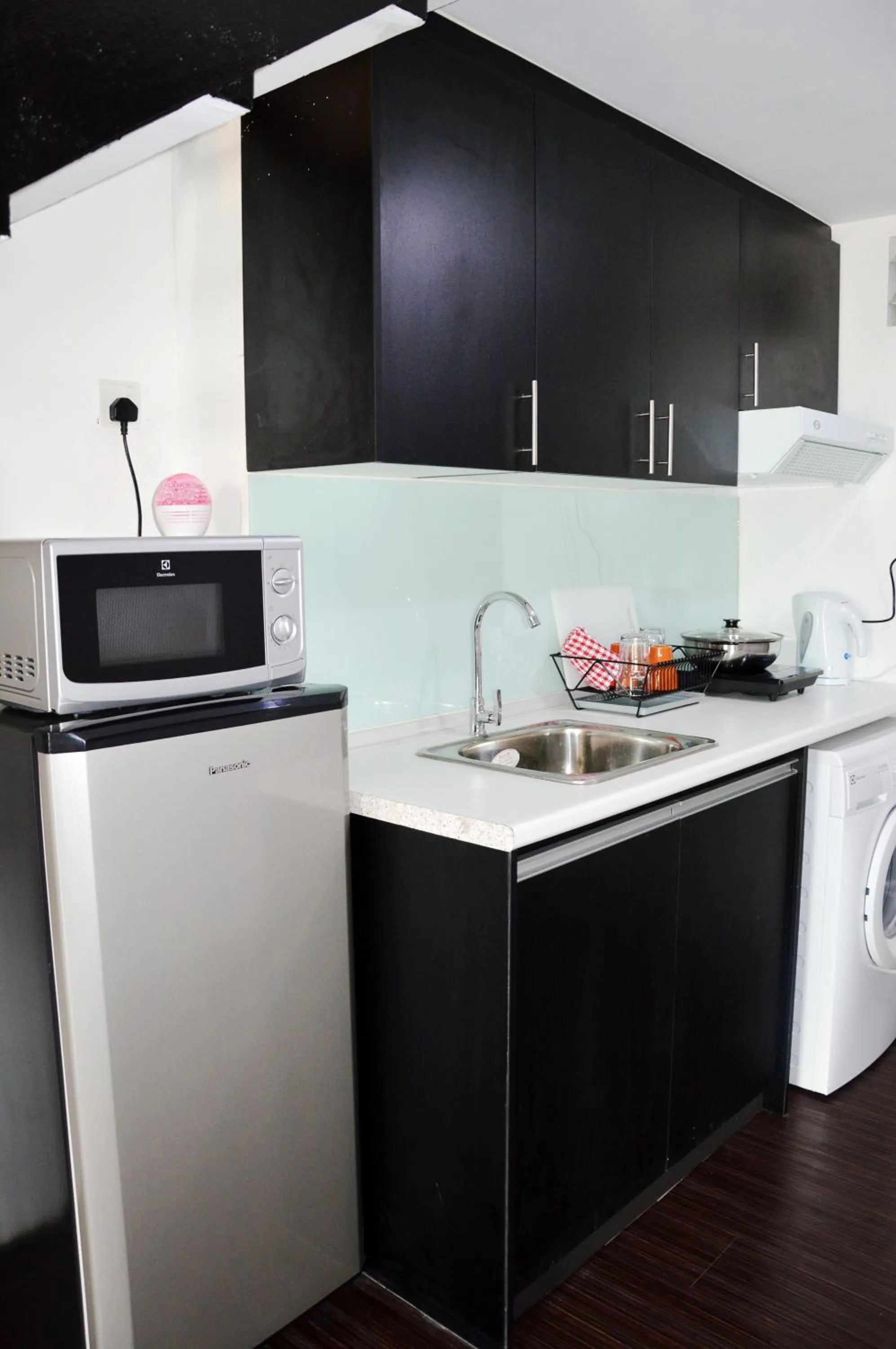 Kitchen or kitchenette in Taragon Residences