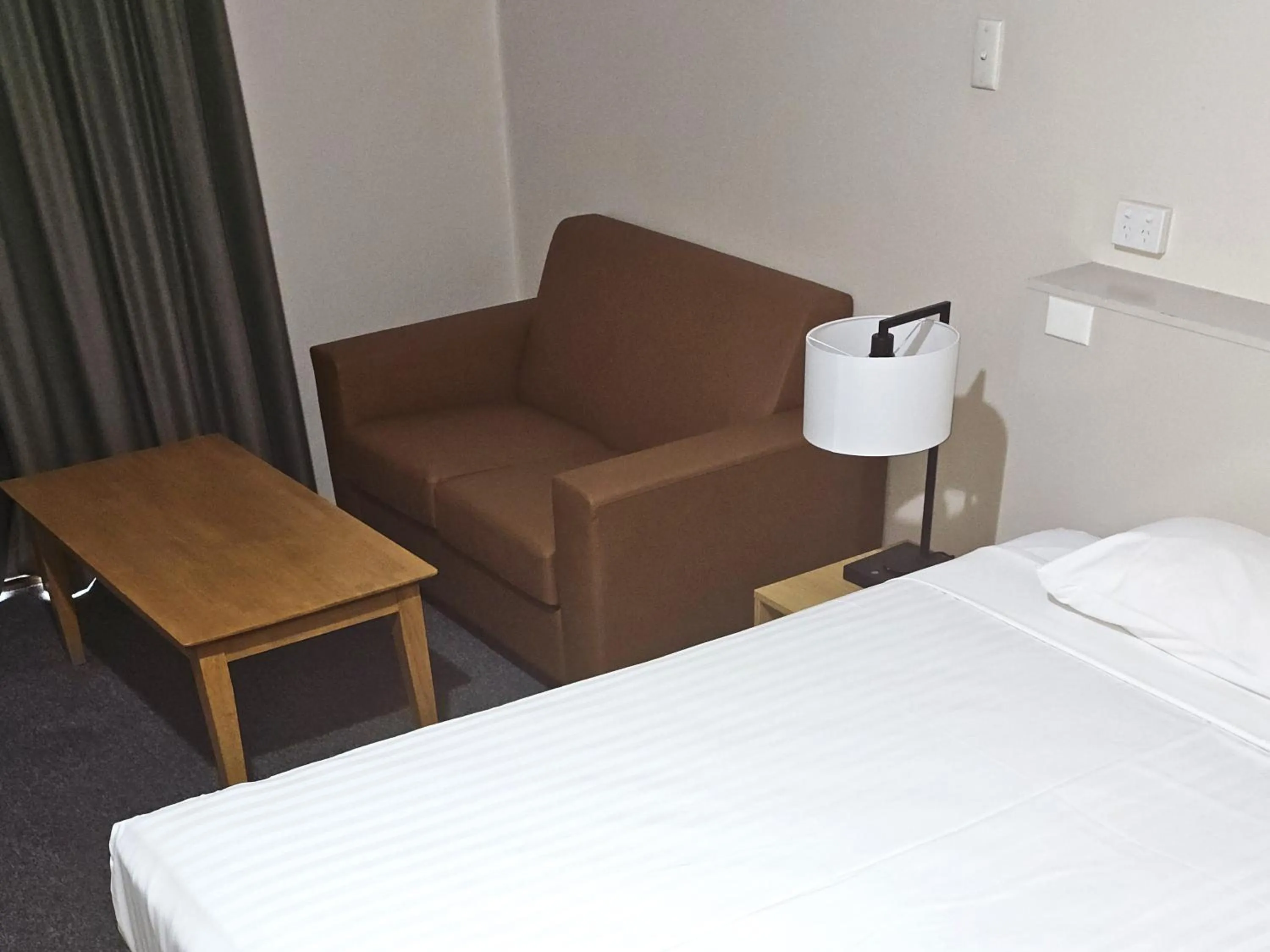 Seating area, Bed in Sanno Marracoonda Perth Airport Hotel