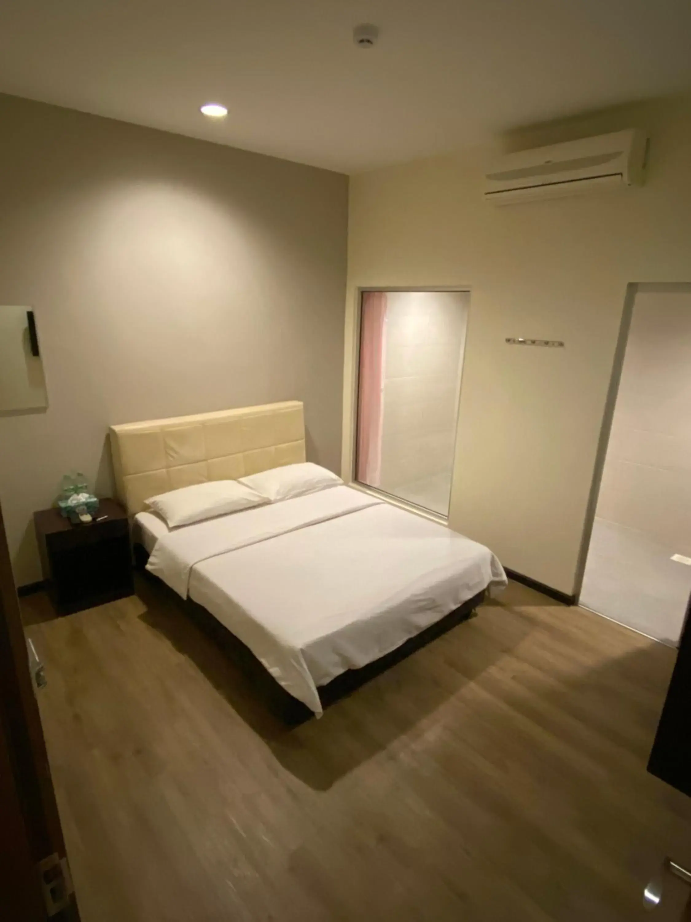 Bed in Raintree Hotel Bed in Raintree Hotel