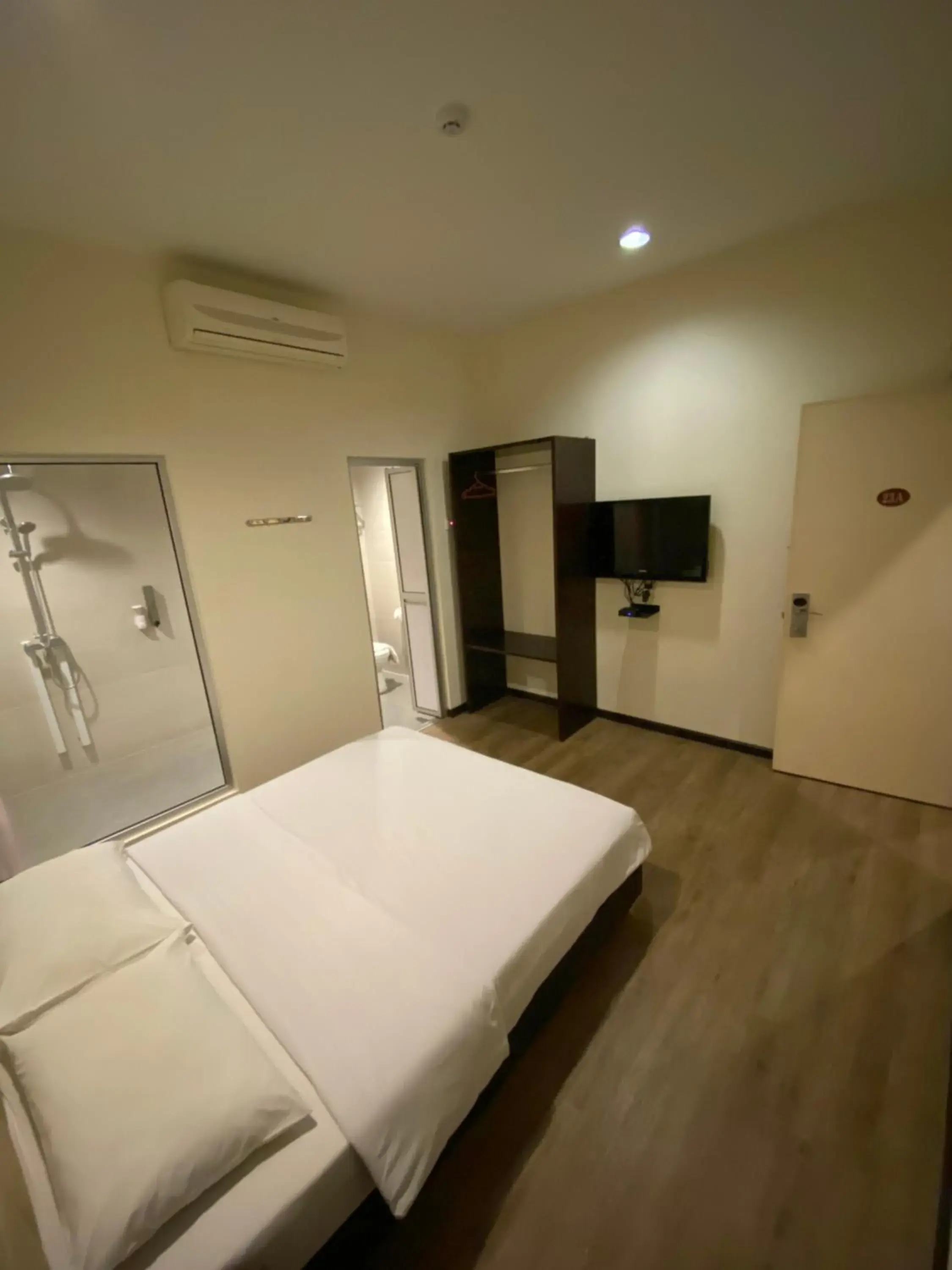 Bed in Raintree Hotel Bed in Raintree Hotel