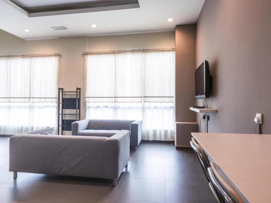 Bed in Raintree Hotel