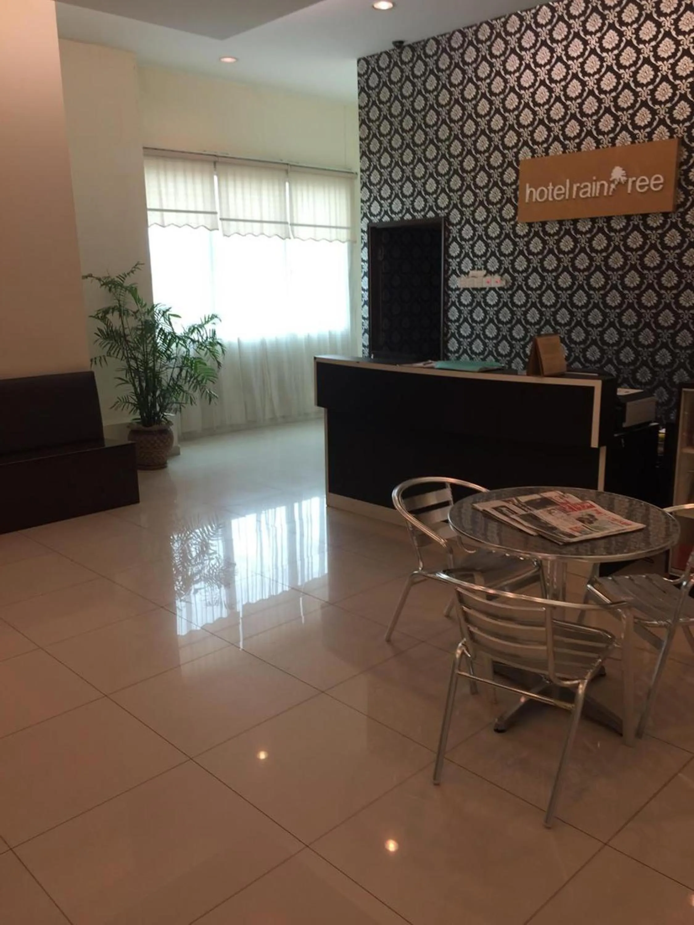 Lobby or reception in Raintree Hotel