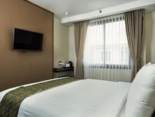 Bed in Savvoya Hotel Seminyak