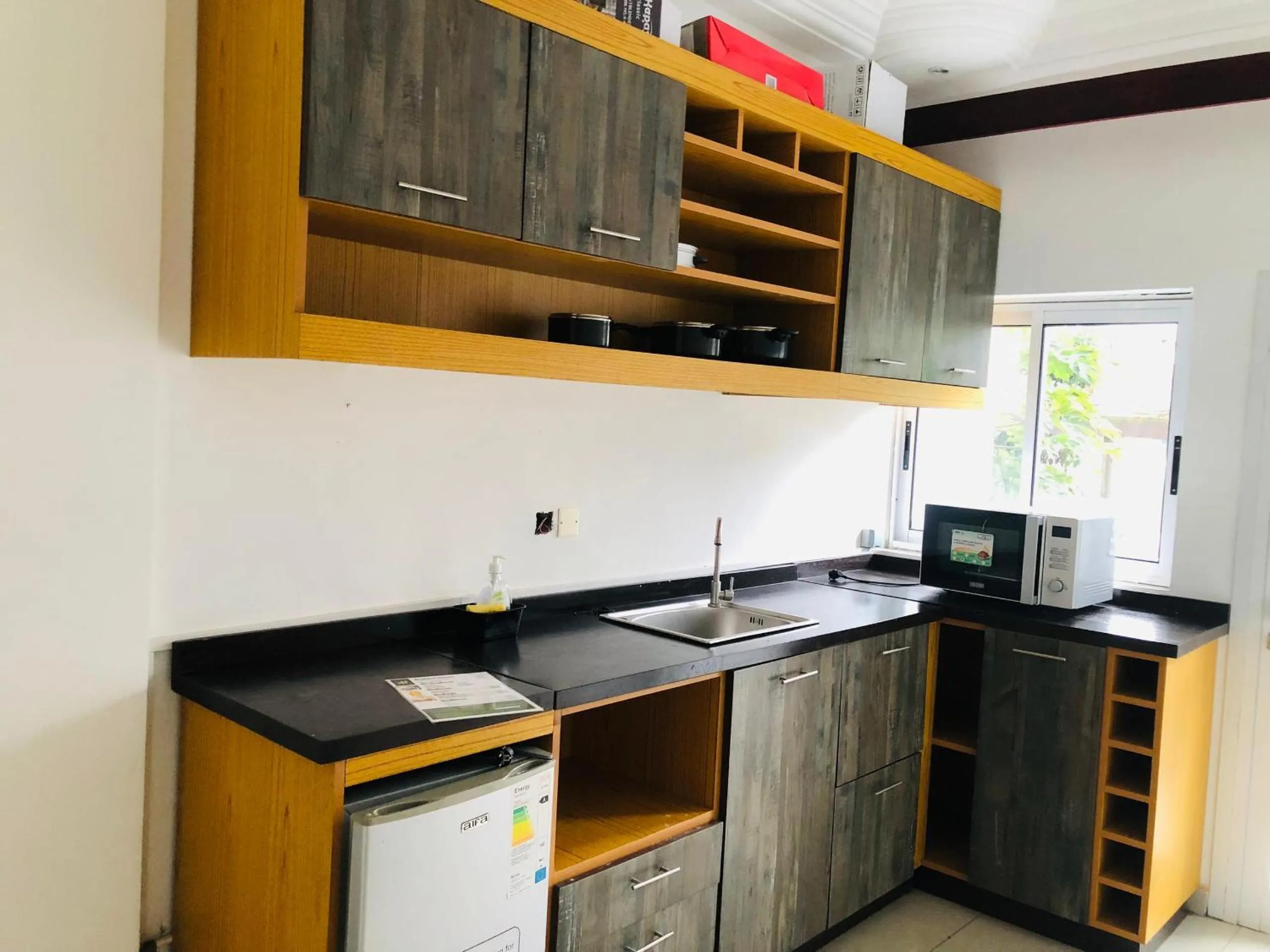 Kitchen or kitchenette in residence hoteliere samba
