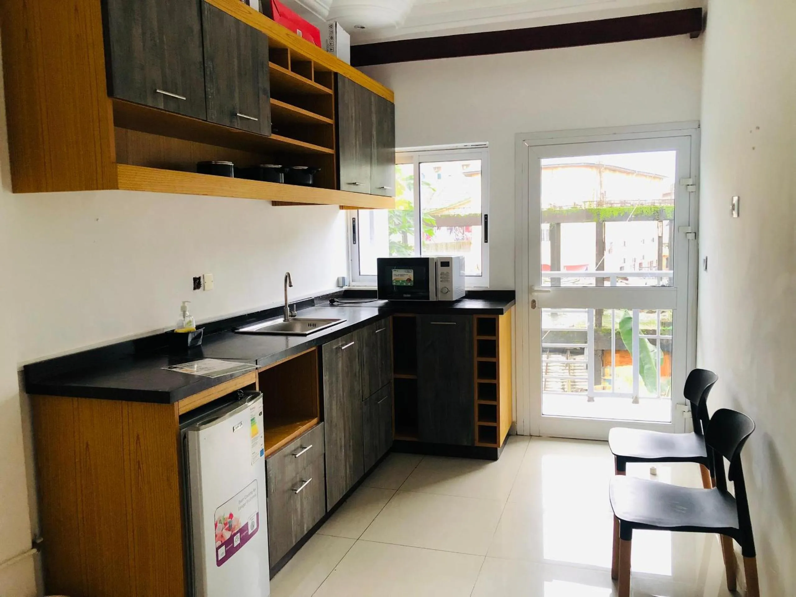 Kitchen or kitchenette in residence hoteliere samba