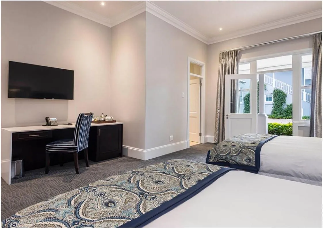 Bed in Luxe Avondale Boutique Hotel