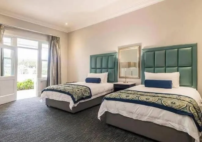 Bedroom, Bed in Luxe Avondale Boutique Hotel
