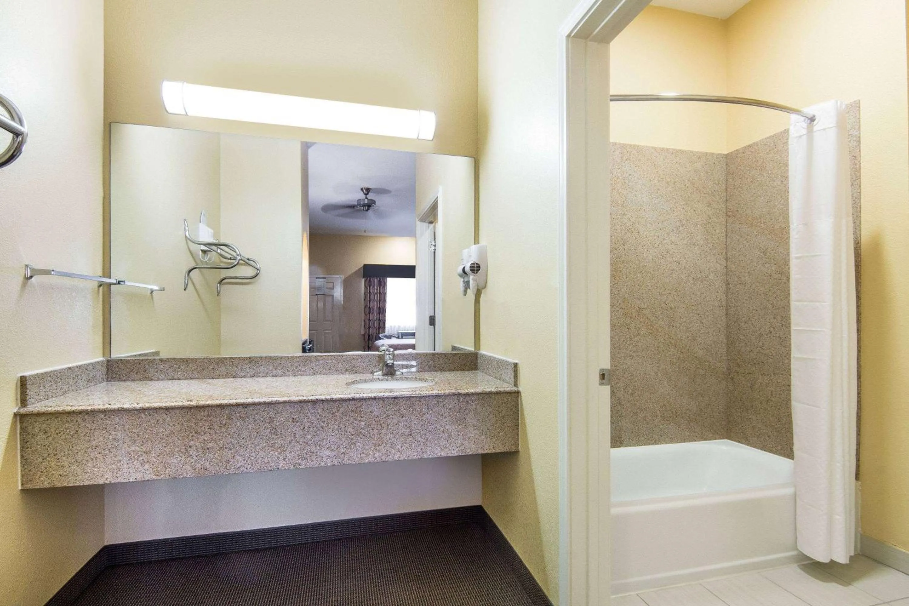 Bathroom in Days Inn by Wyndham Baytown East