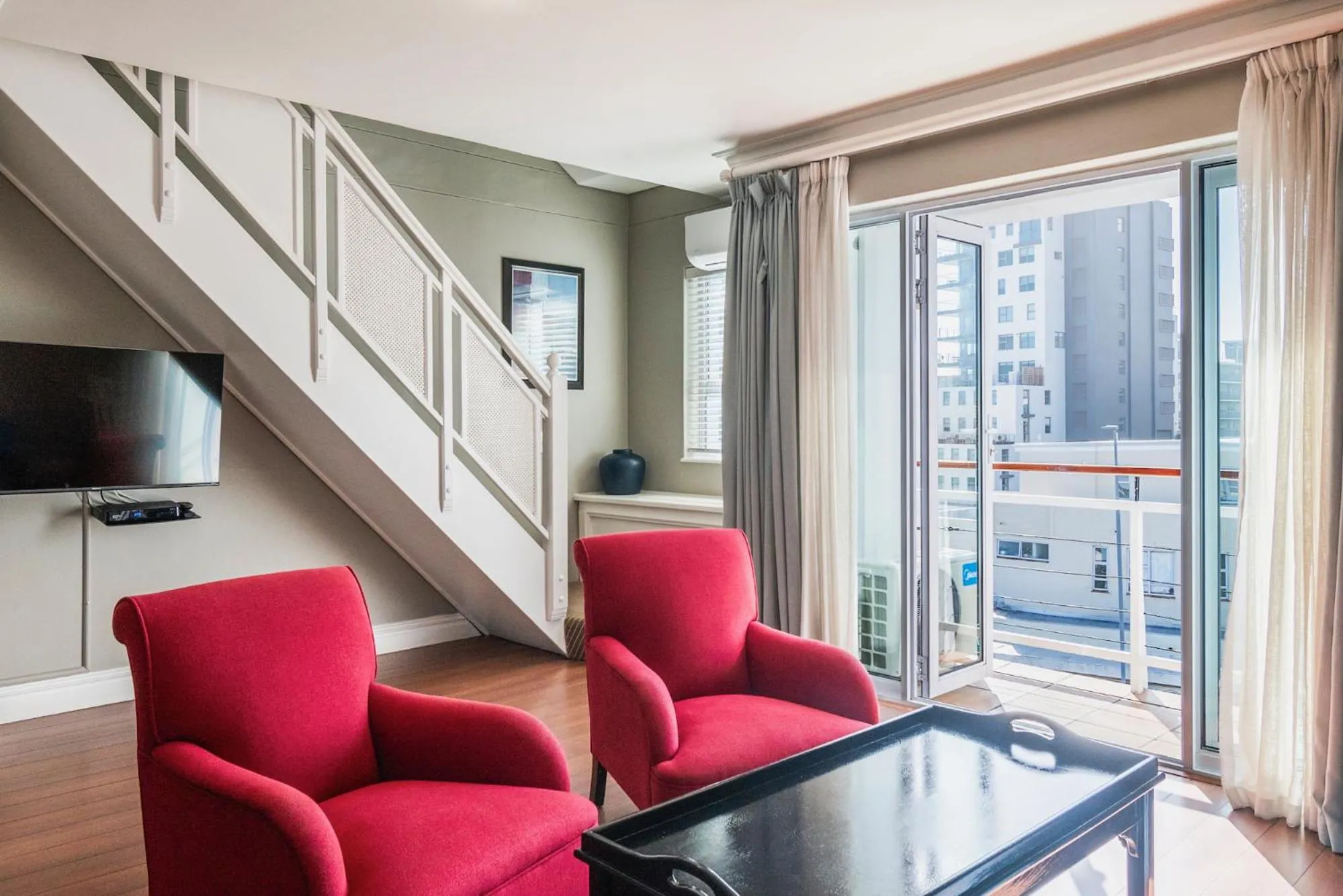 Seating area in The Bantry Aparthotel by Totalstay