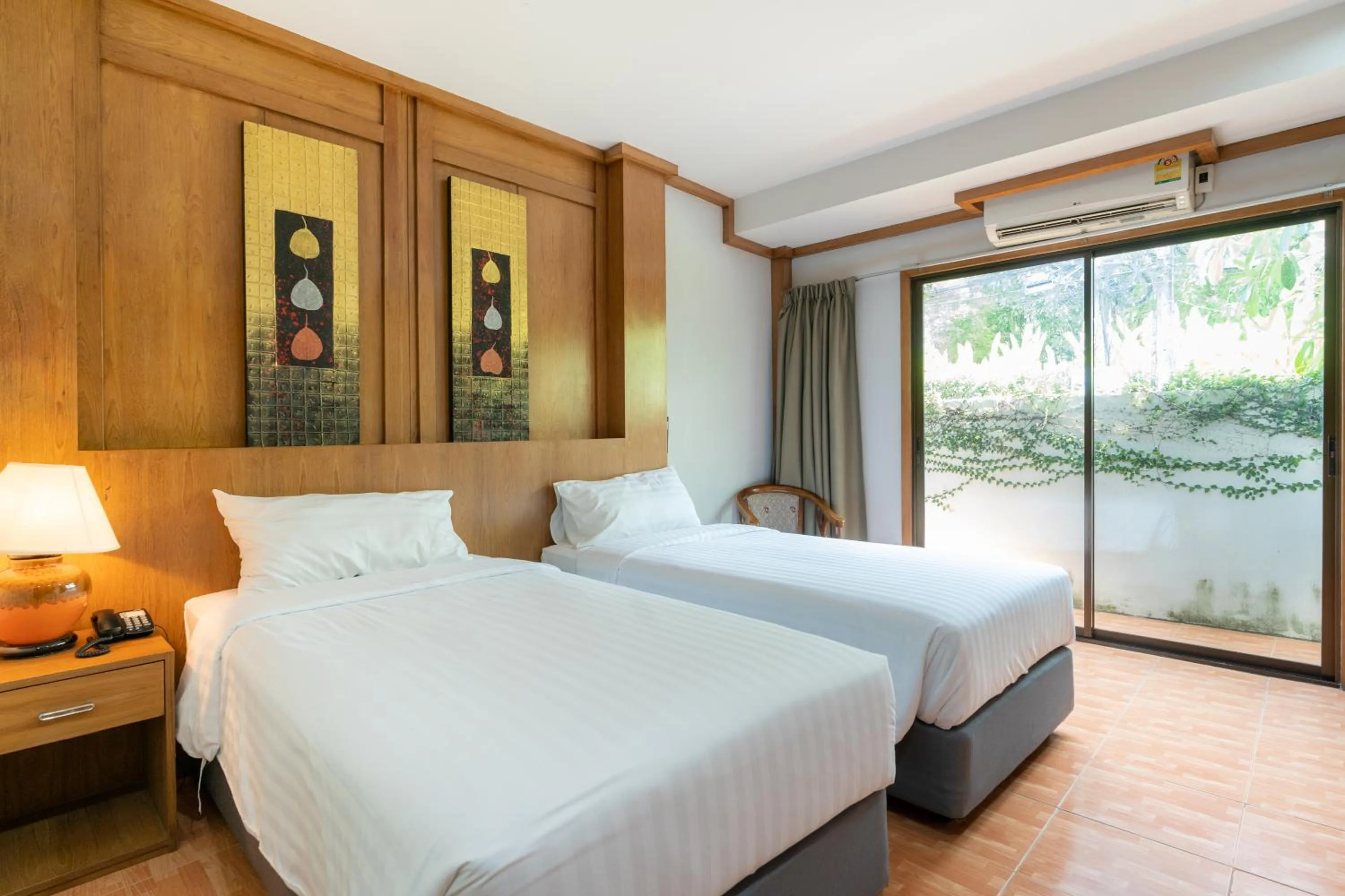 Bed in Chabana Resort Bang-tao Beach Phuket- SHA Extra Plus