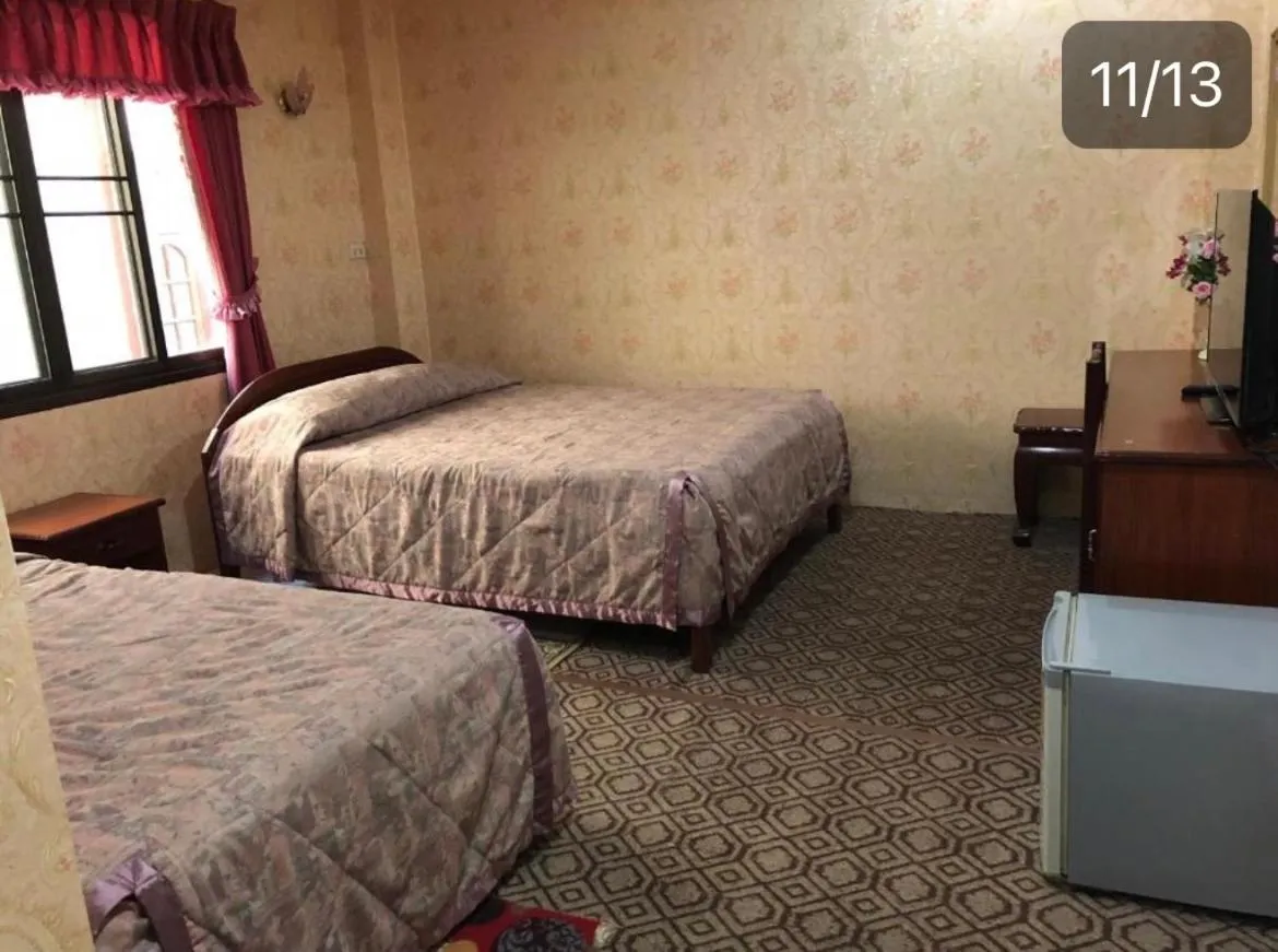 Bed in Thaveesinh Hotel