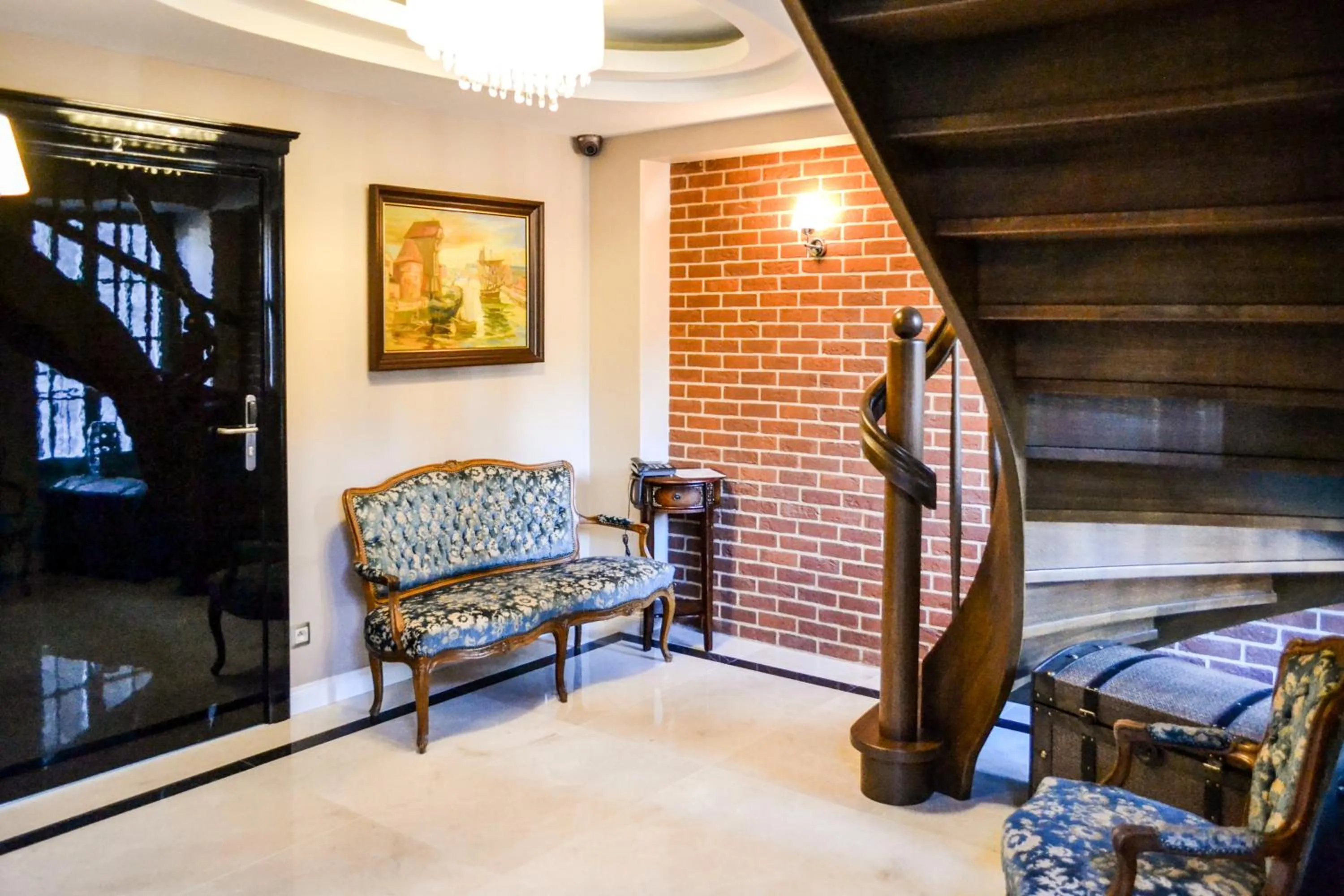 Lobby or reception in Komturia Old Town by Fahrenheit