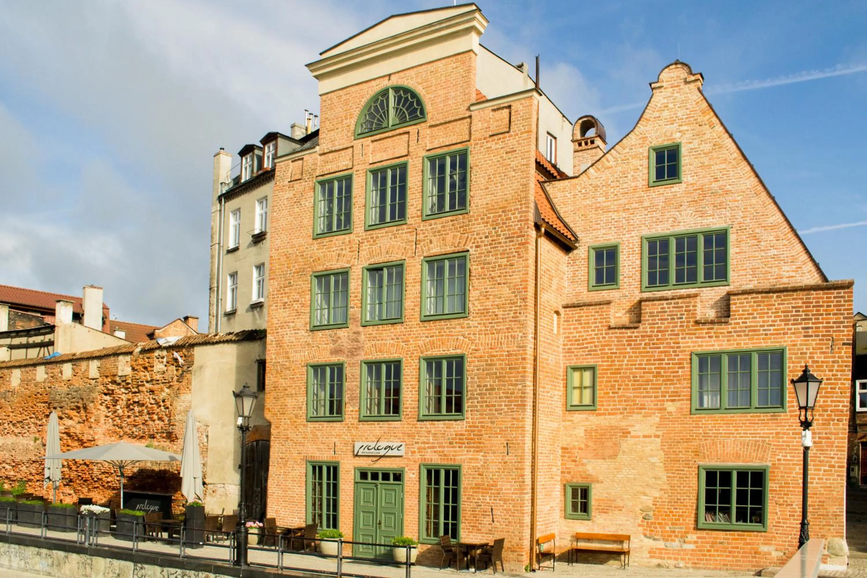 Property building in Komturia Old Town by Fahrenheit