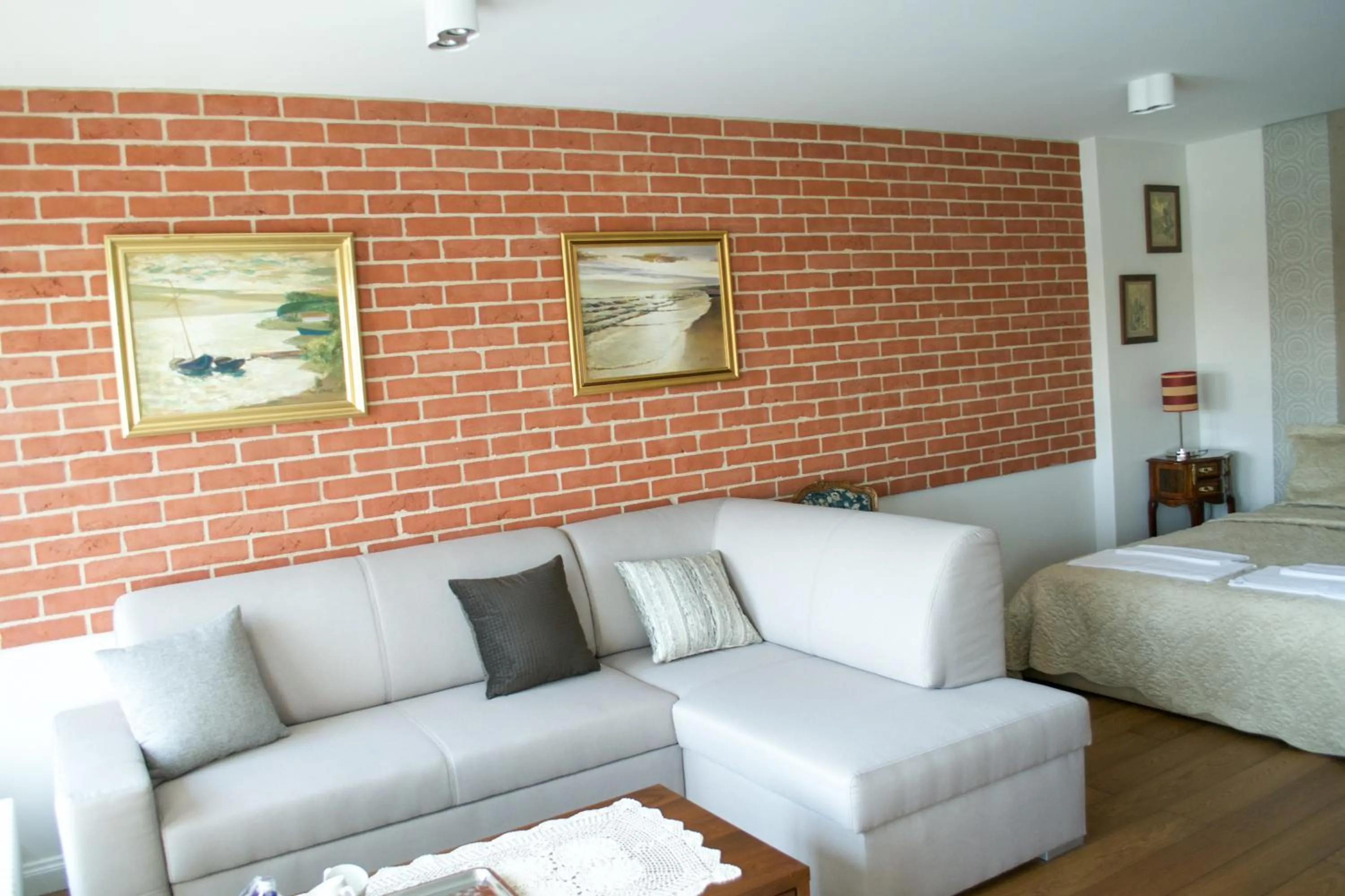 Living room in Komturia Old Town by Fahrenheit