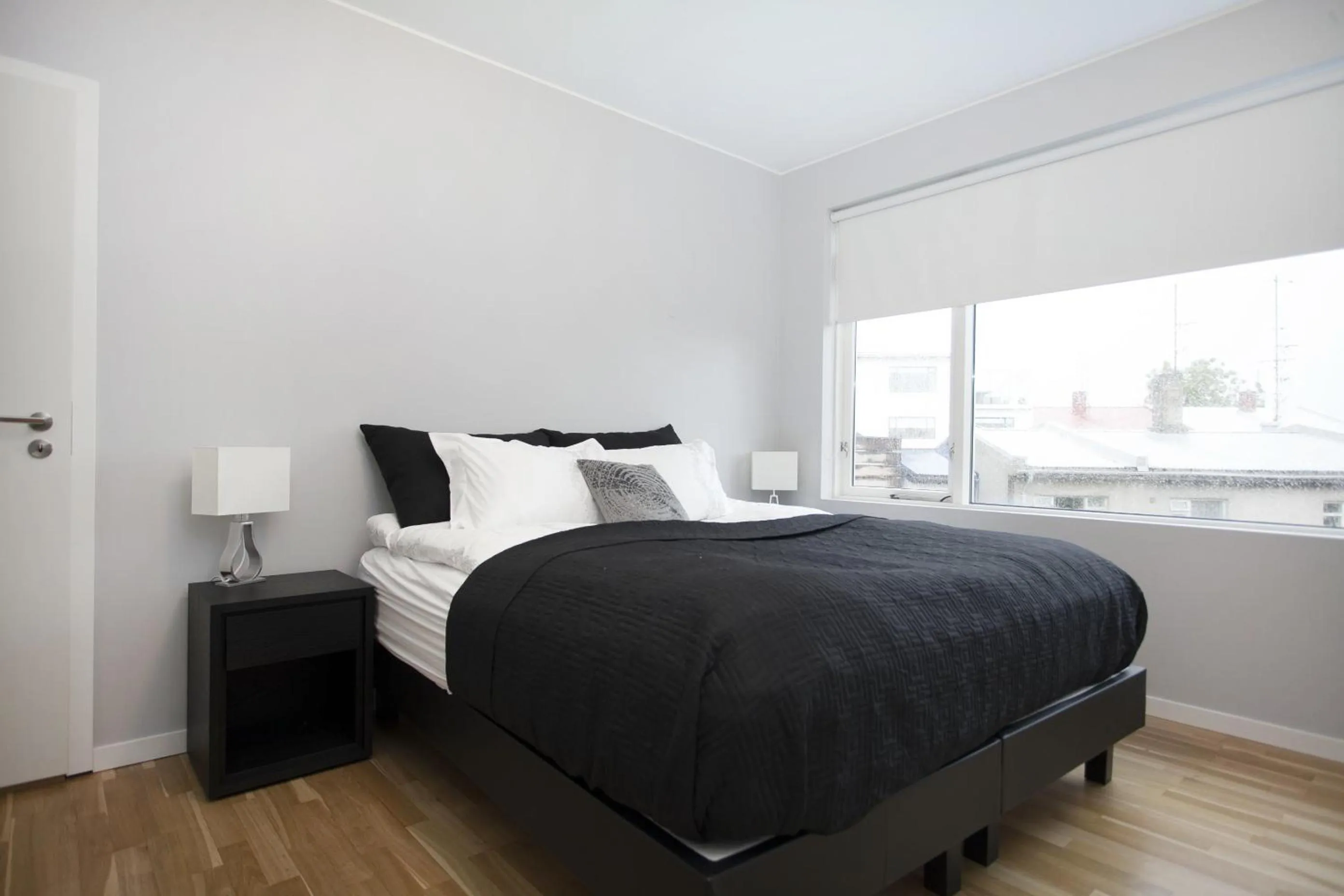 Bed in Blue Luxury Apartments