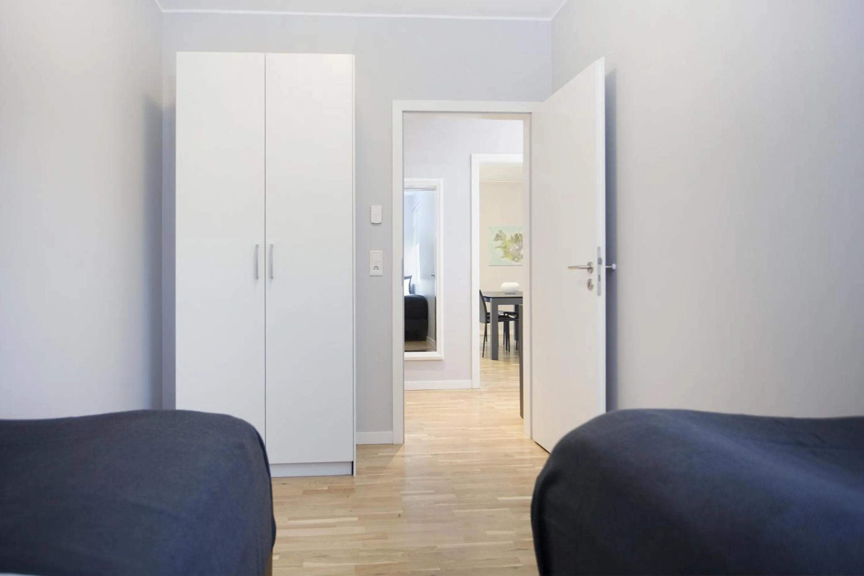 Bedroom in Blue Luxury Apartments