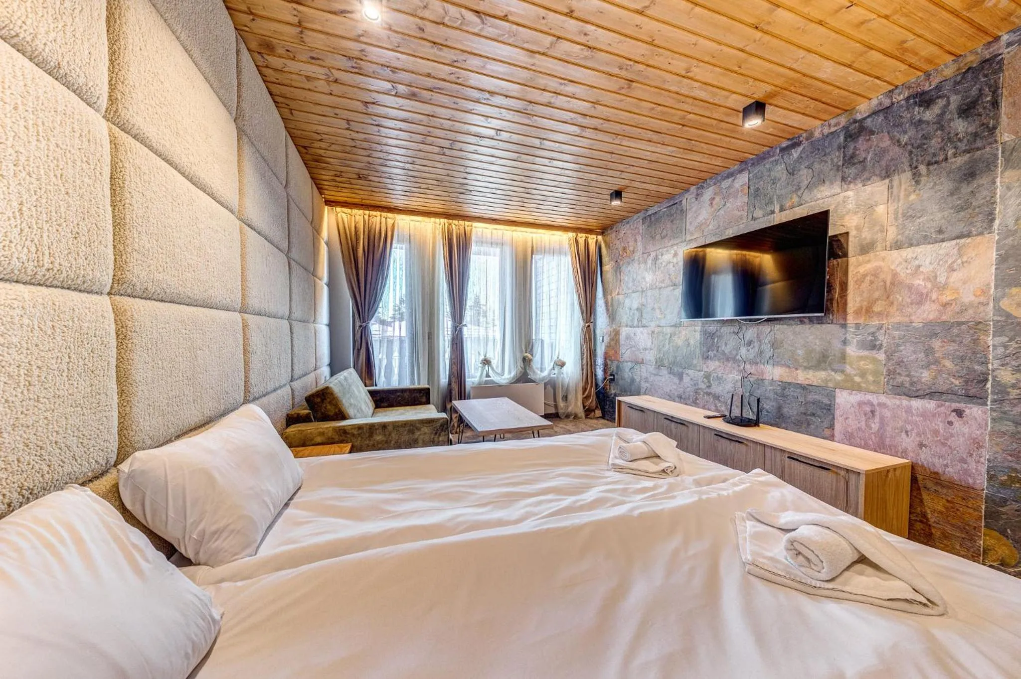 Bed in Grand Resort Pamporovo Apartments