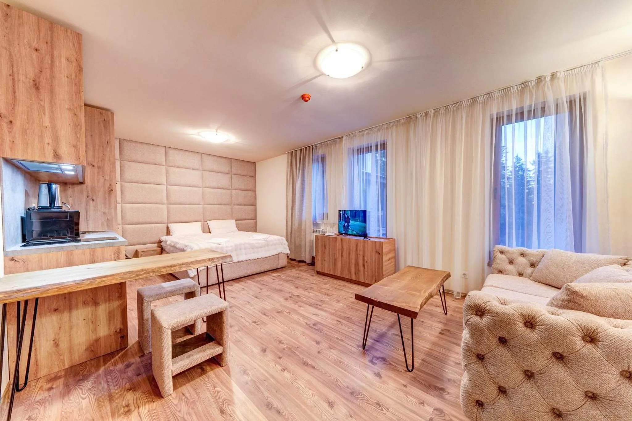 Communal lounge/ TV room in Grand Resort Pamporovo Apartments