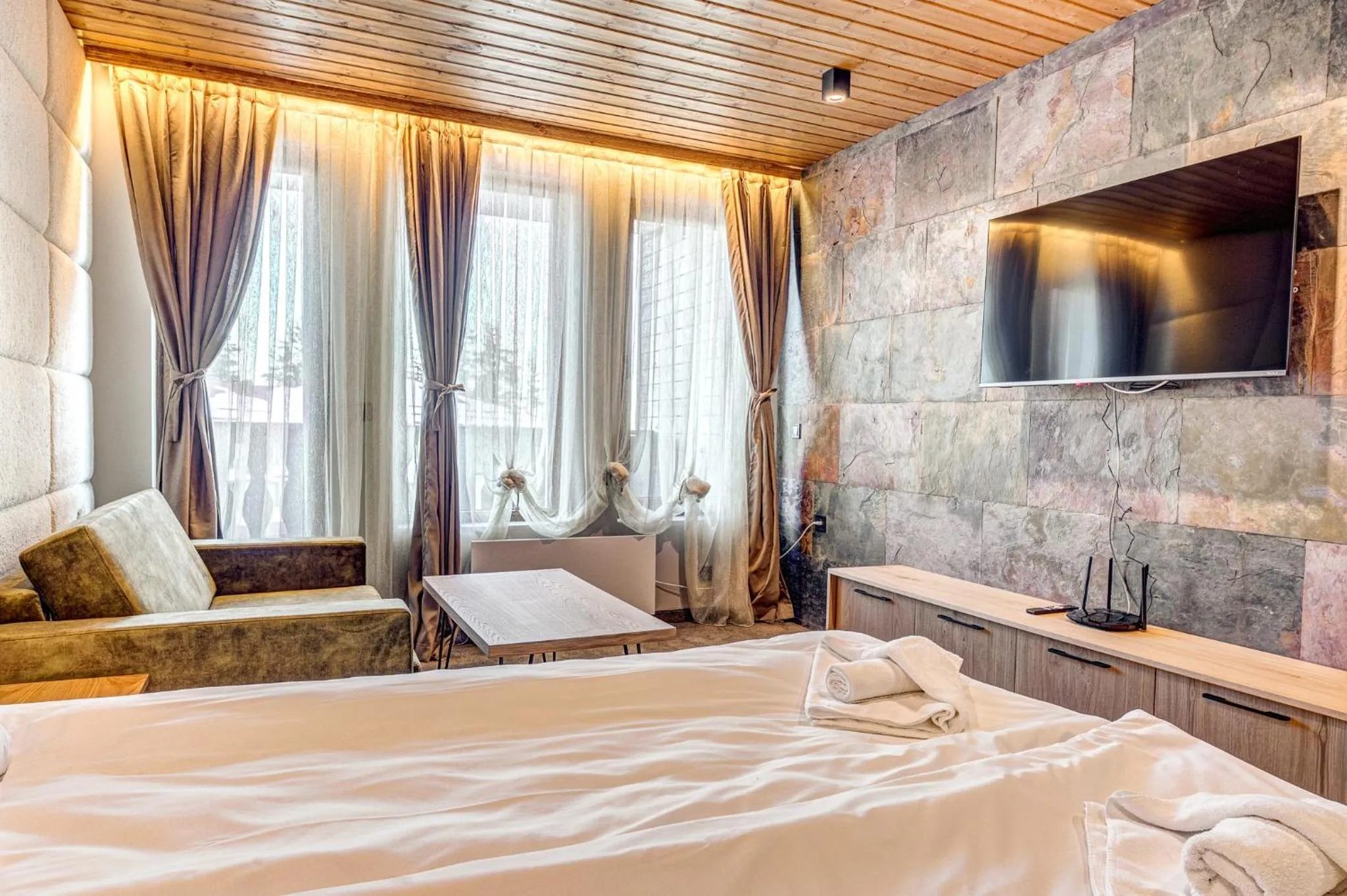 Bed in Grand Resort Pamporovo Apartments