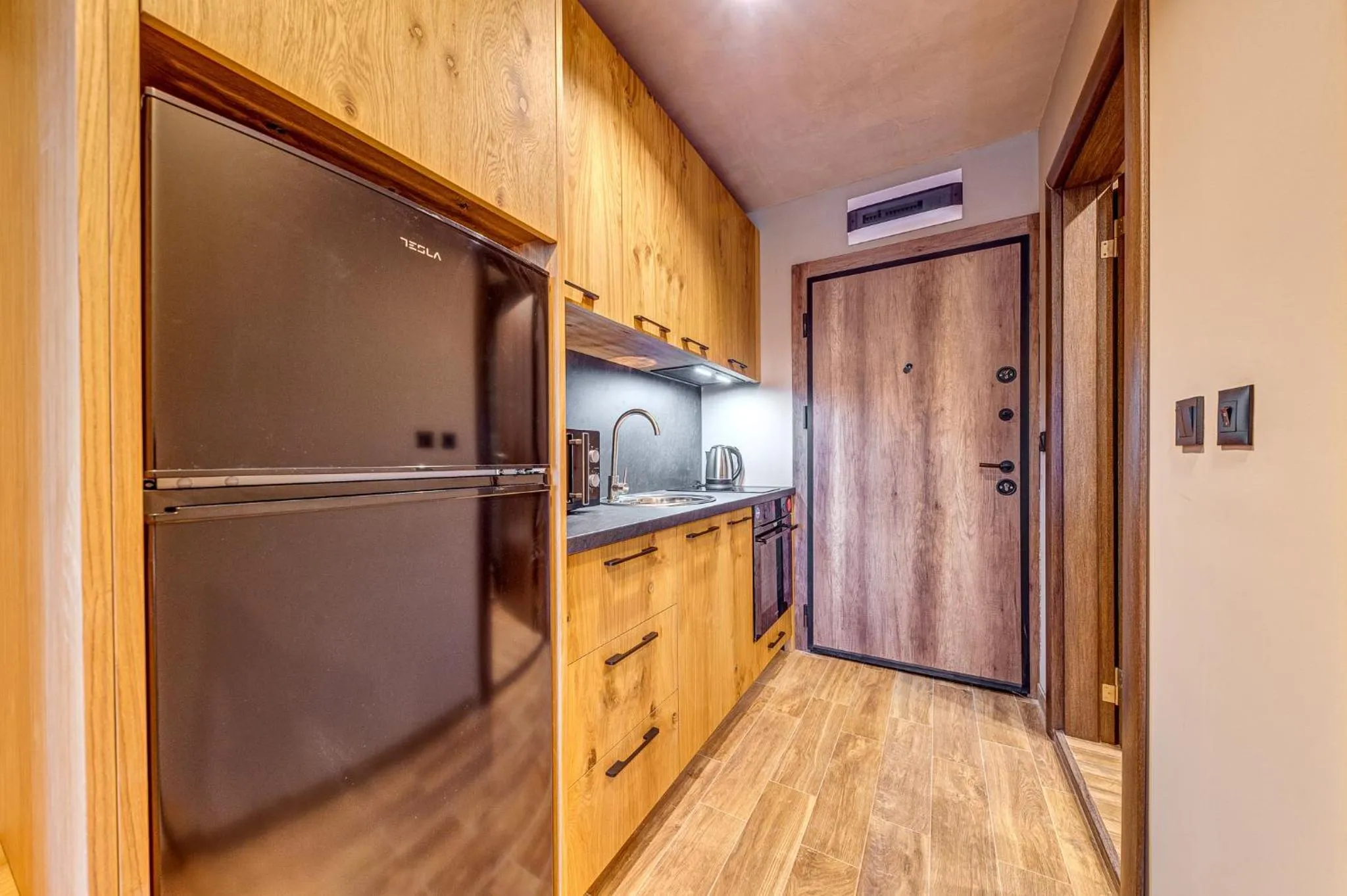 Kitchen or kitchenette in Grand Resort Pamporovo Apartments