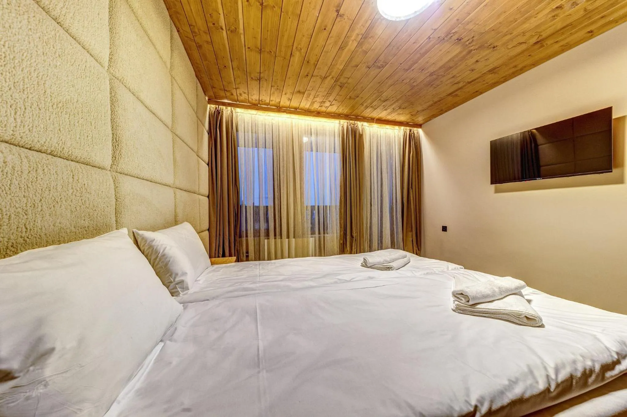 Bed in Grand Resort Pamporovo Apartments