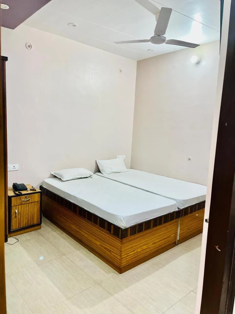 Photo of the whole room, Bed in Hotel Krishna Gorakhpur