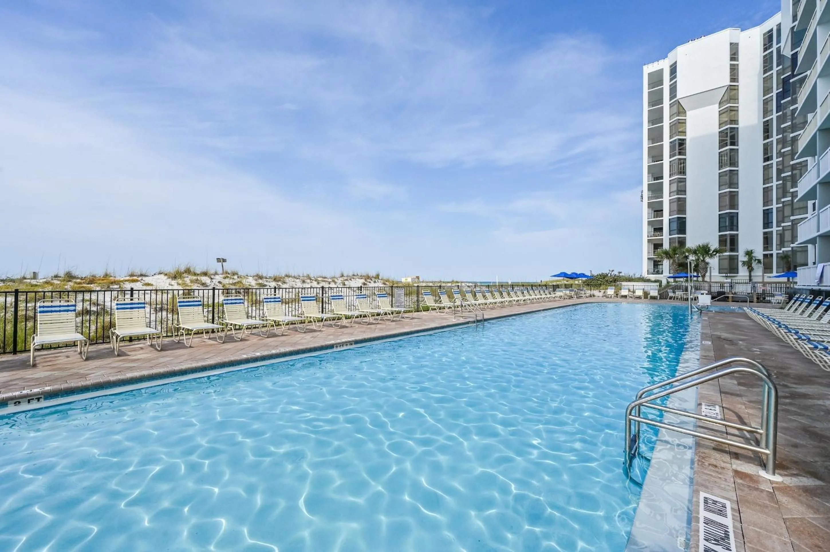 Property building in Pelican Beach Resort by Panhandle Getaways