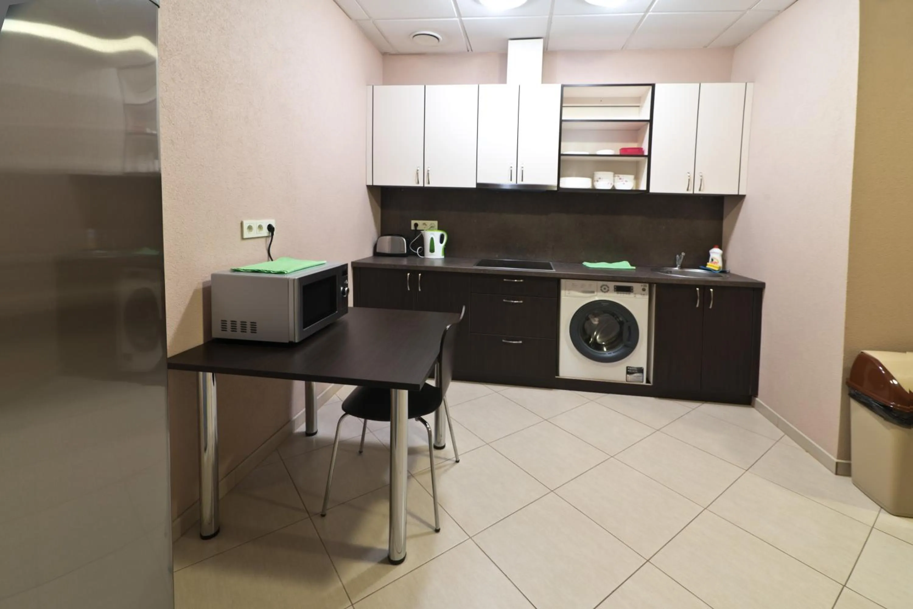 Communal kitchen in Bella Riga Hotel with Self-Check in