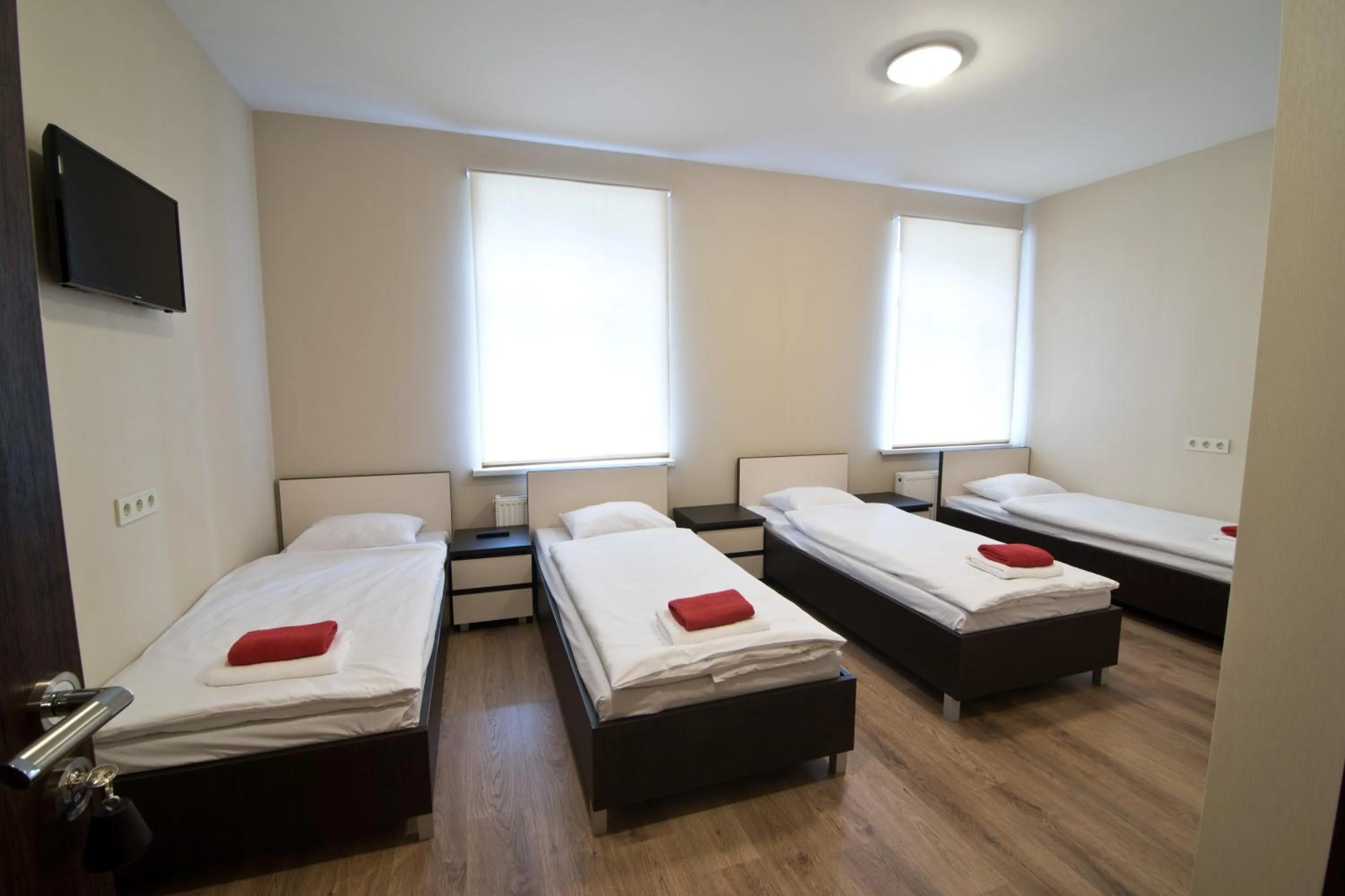 Bed in Bella Riga Hotel with Self-Check in